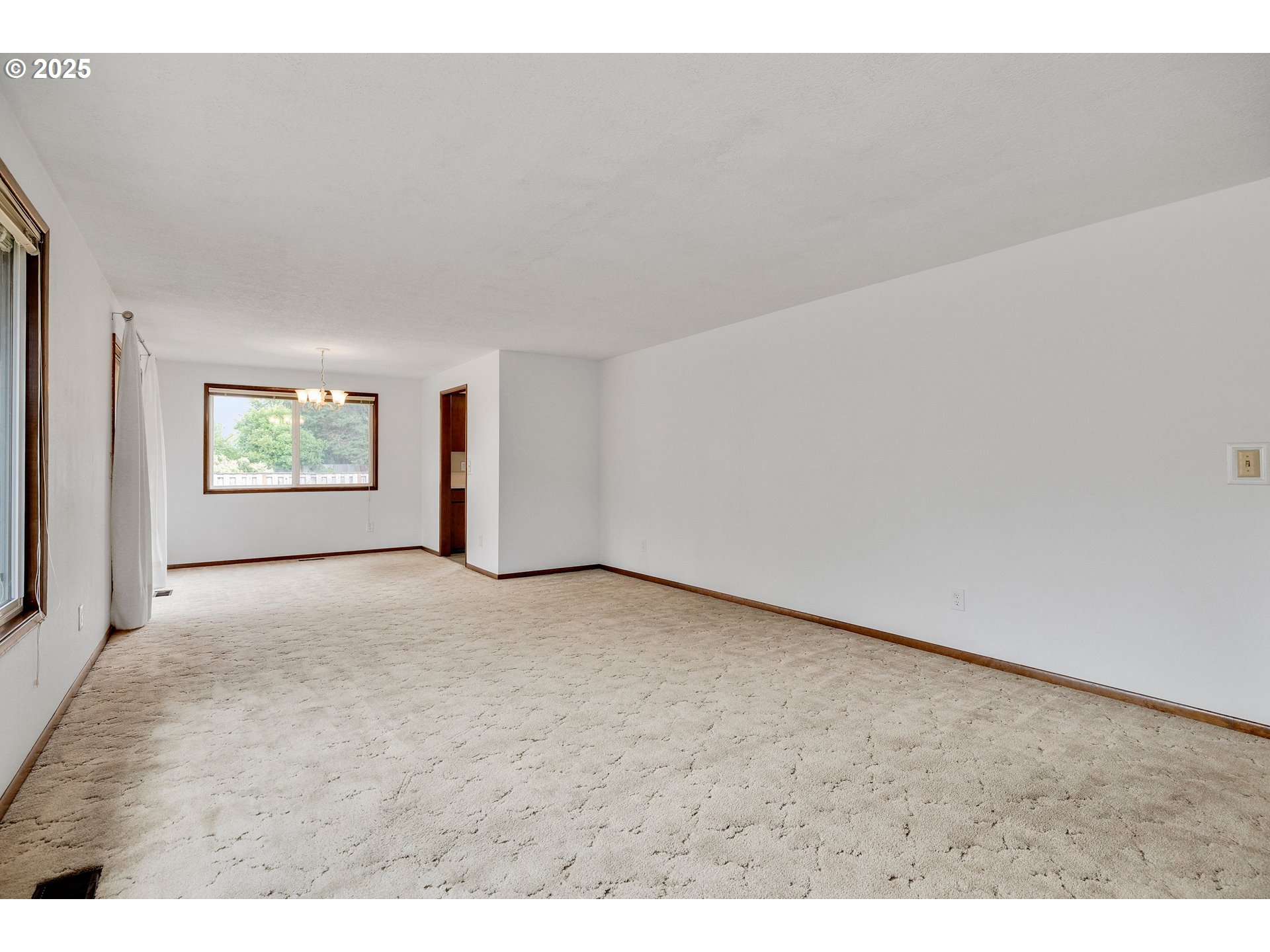 210 Forest Place Forest Grove, OR 97116 - Photo 16 of 35 a view of an empty room and a window