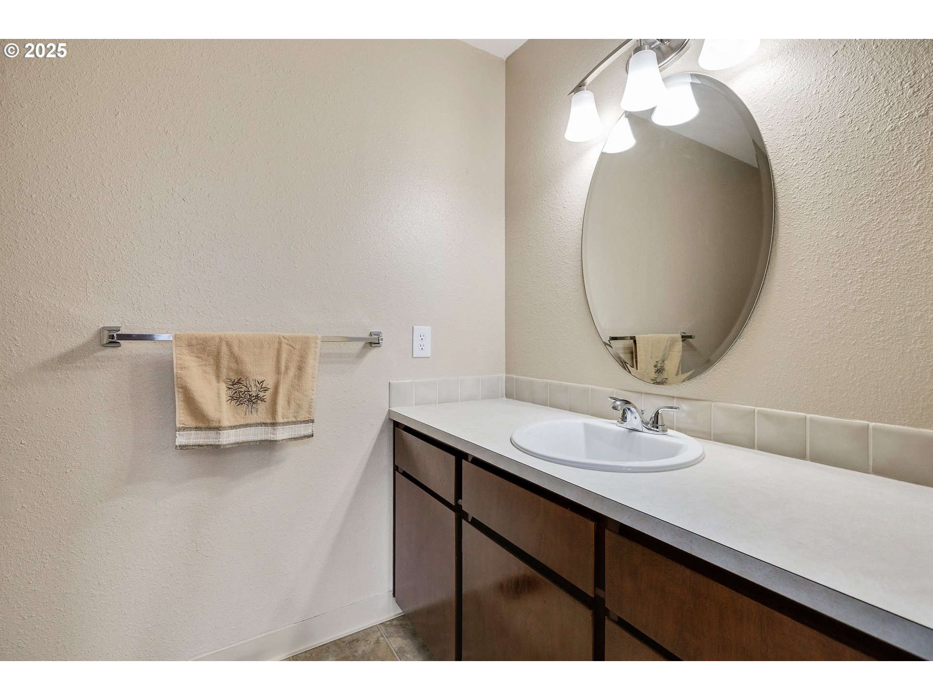 210 Forest Place Forest Grove, OR 97116 - Photo 31 of 35 a bathroom with a sink vanity and a mirror