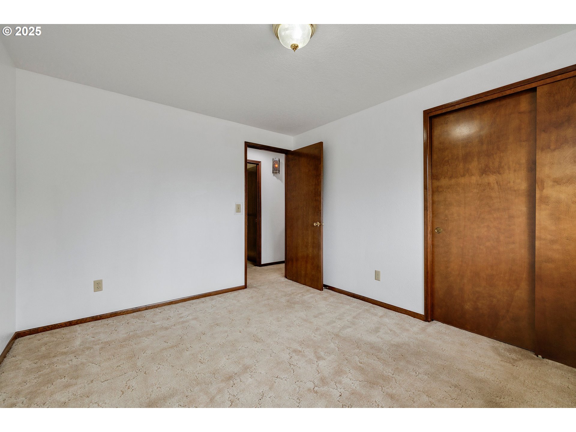 210 Forest Place Forest Grove, OR 97116 - Photo 32 of 35 a view of an empty room with a window