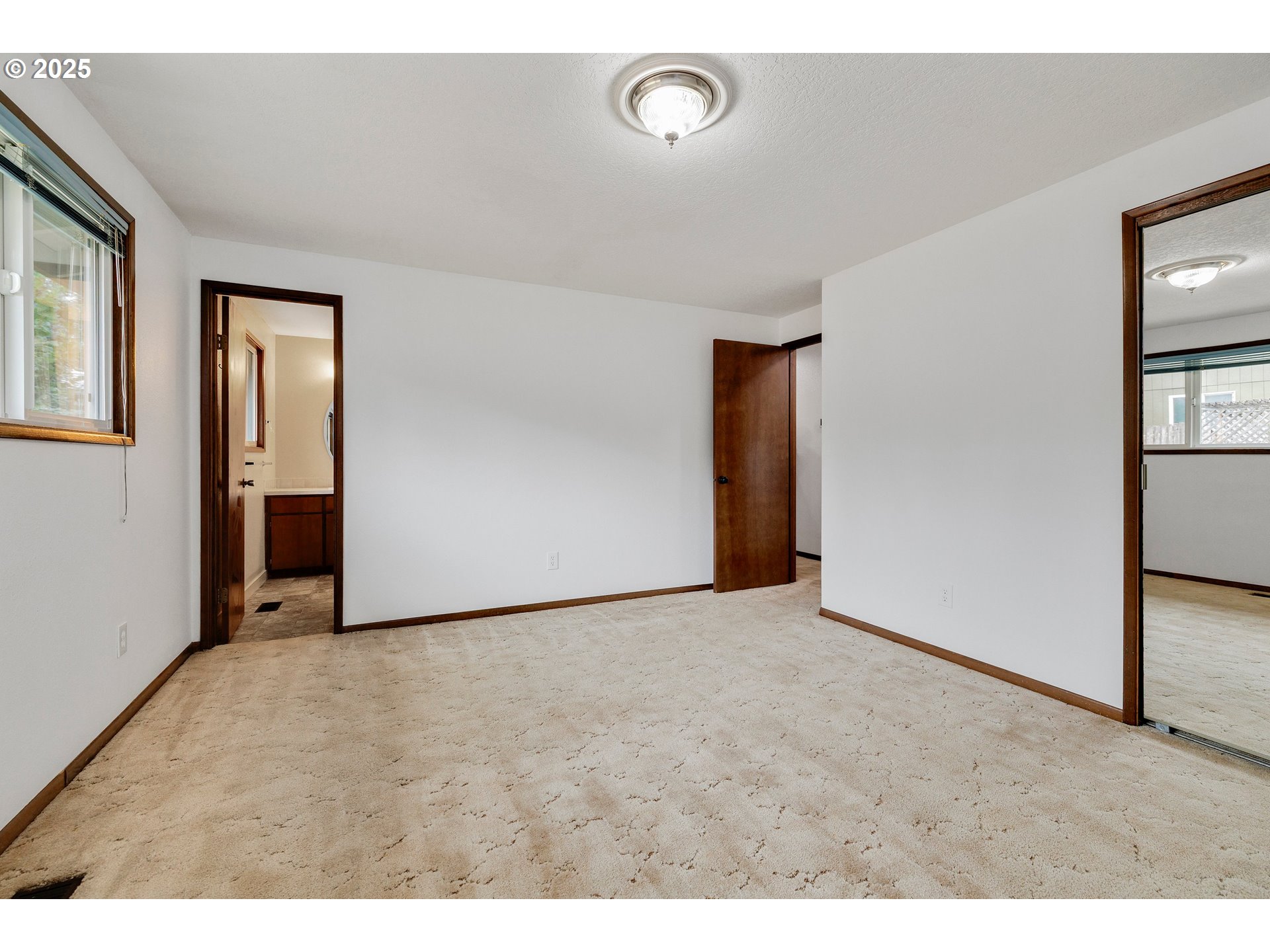 210 Forest Place Forest Grove, OR 97116 - Photo 33 of 35 a view of an empty room with window and closet area