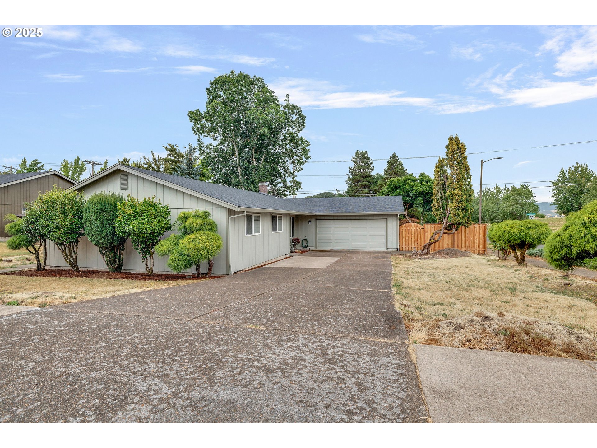 210 Forest Place Forest Grove, OR 97116 - Photo 5 of 35 a view of a house with a outdoor space