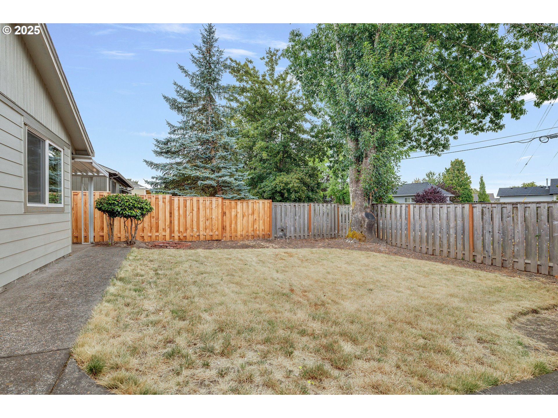 210 Forest Place Forest Grove, OR 97116 - Photo 10 of 35 a row of white house with wooden fence
