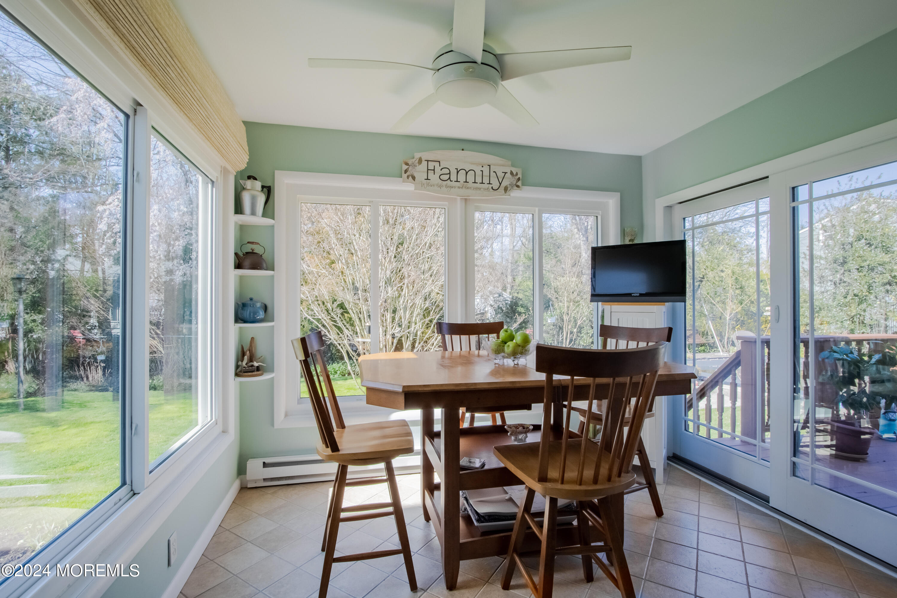 21 Rivers Edge Drive Little Silver, NJ 07739 - Photo 13 of 56 a view of a dining room with furniture window and outside view