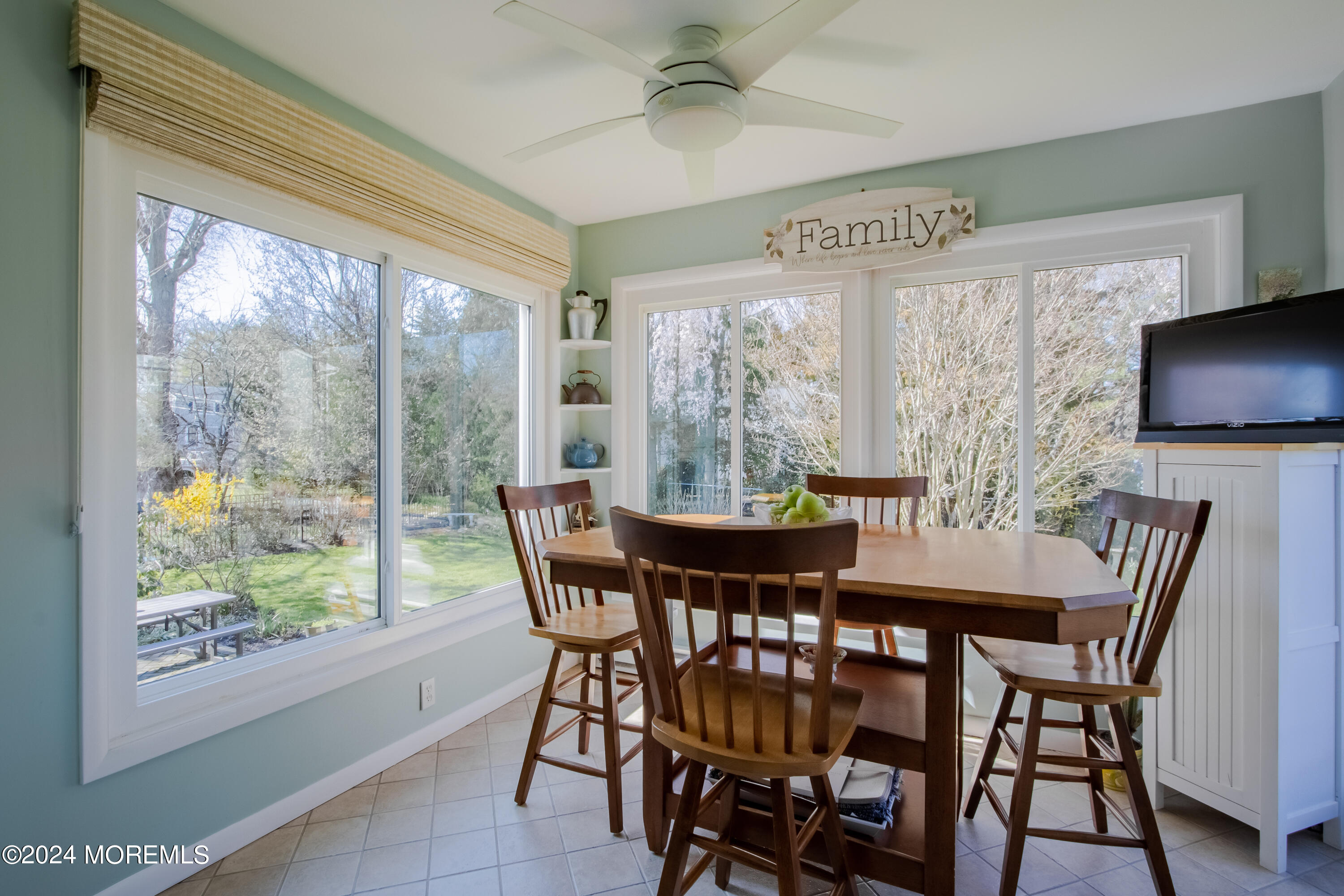 21 Rivers Edge Drive Little Silver, NJ 07739 - Photo 14 of 56 a view of a dining room with furniture window and outside view