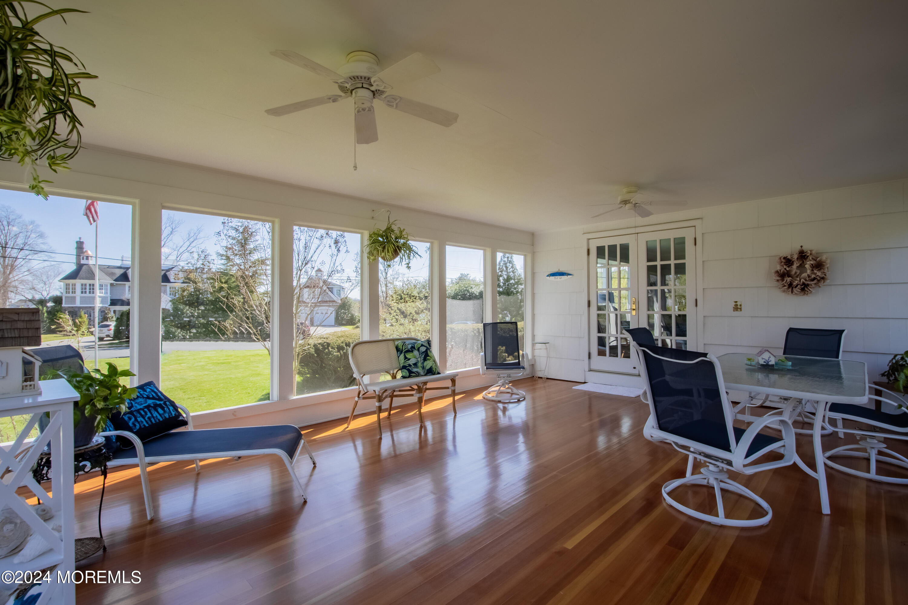 21 Rivers Edge Drive Little Silver, NJ 07739 - Photo 19 of 56 a living room with furniture large windows and wooden floor