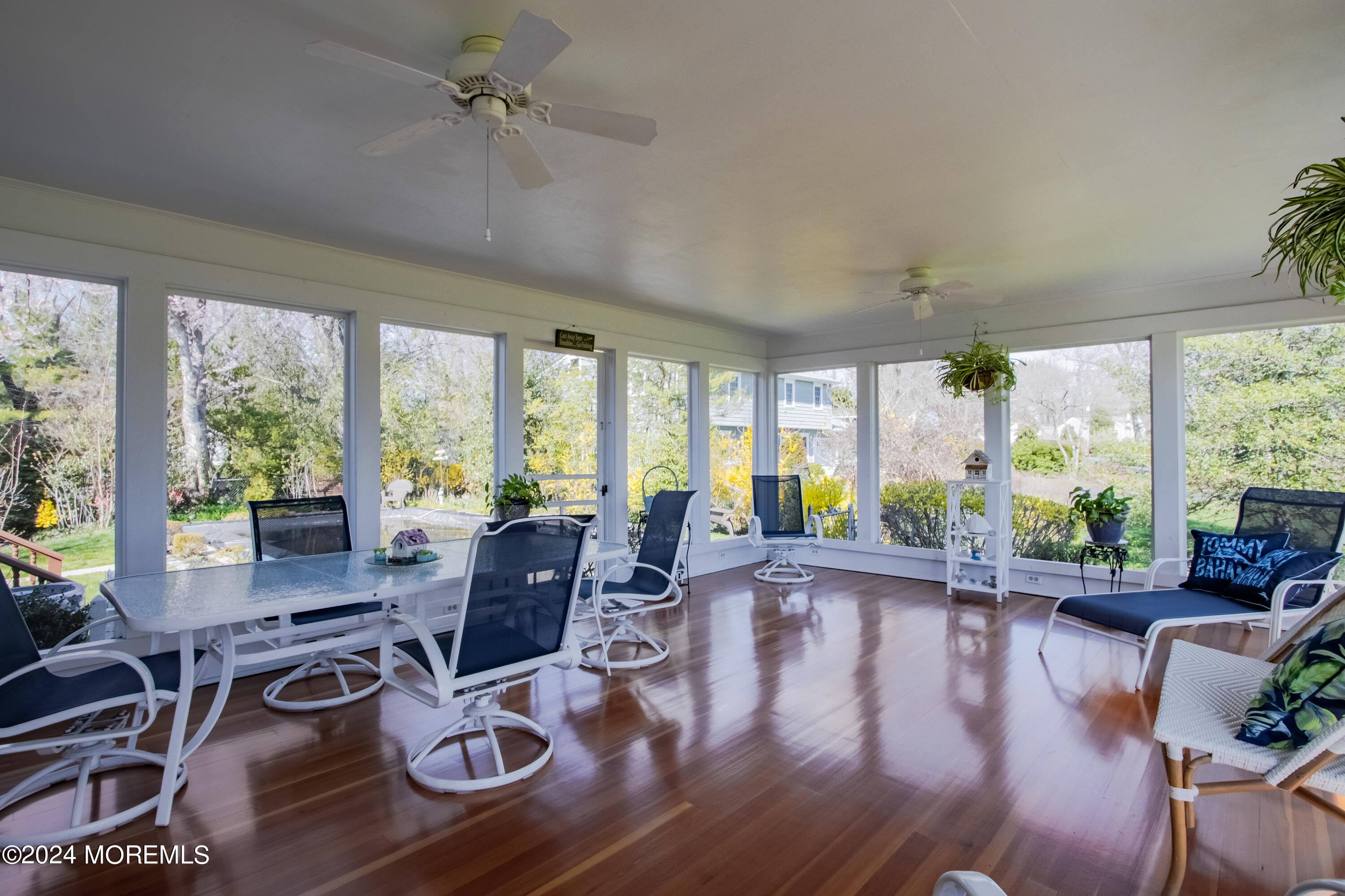 21 Rivers Edge Drive Little Silver, NJ 07739 - Photo 20 of 56 a living room with furniture large window and wooden floor