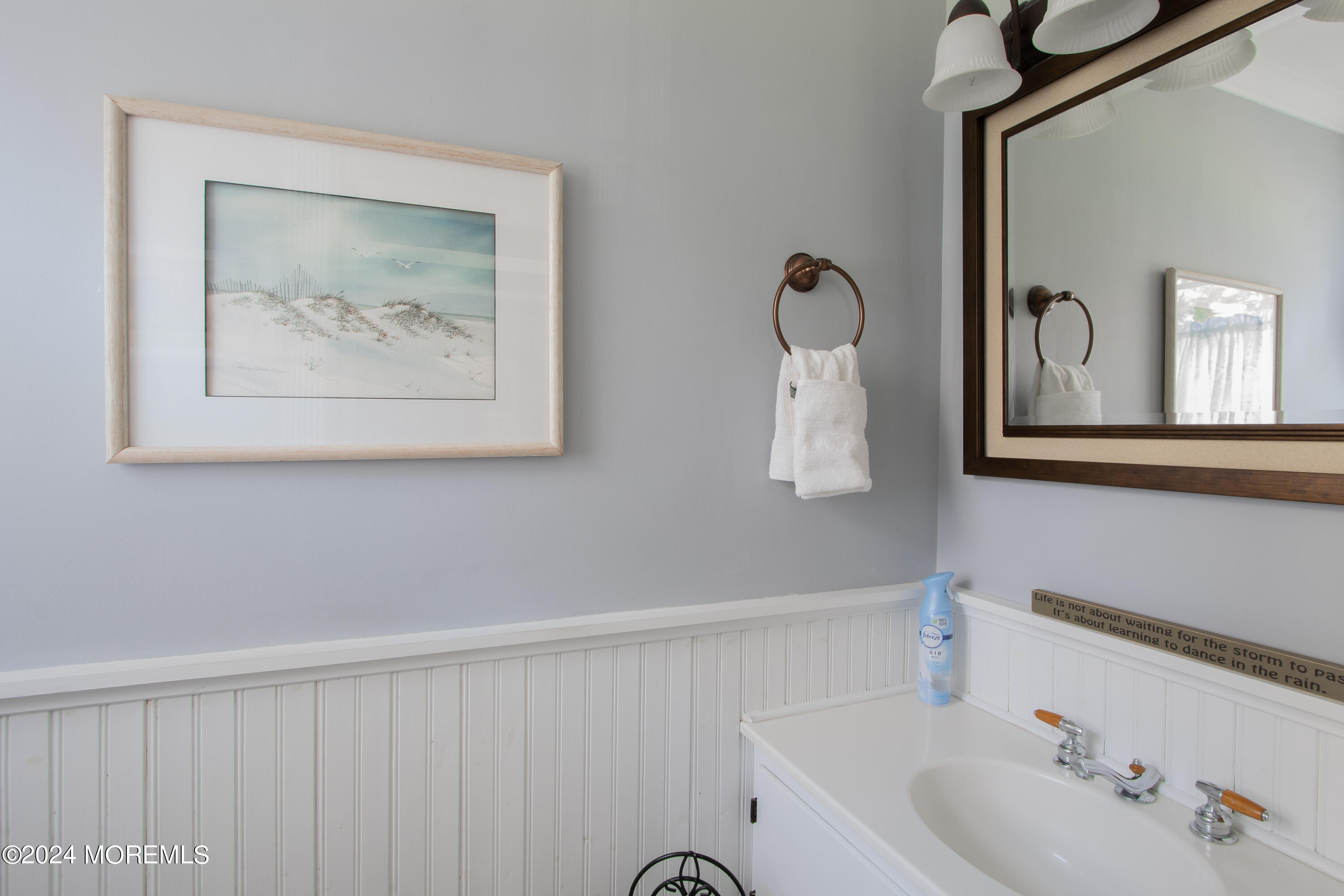 21 Rivers Edge Drive Little Silver, NJ 07739 - Photo 24 of 56 a bathroom with a sink and a mirror
