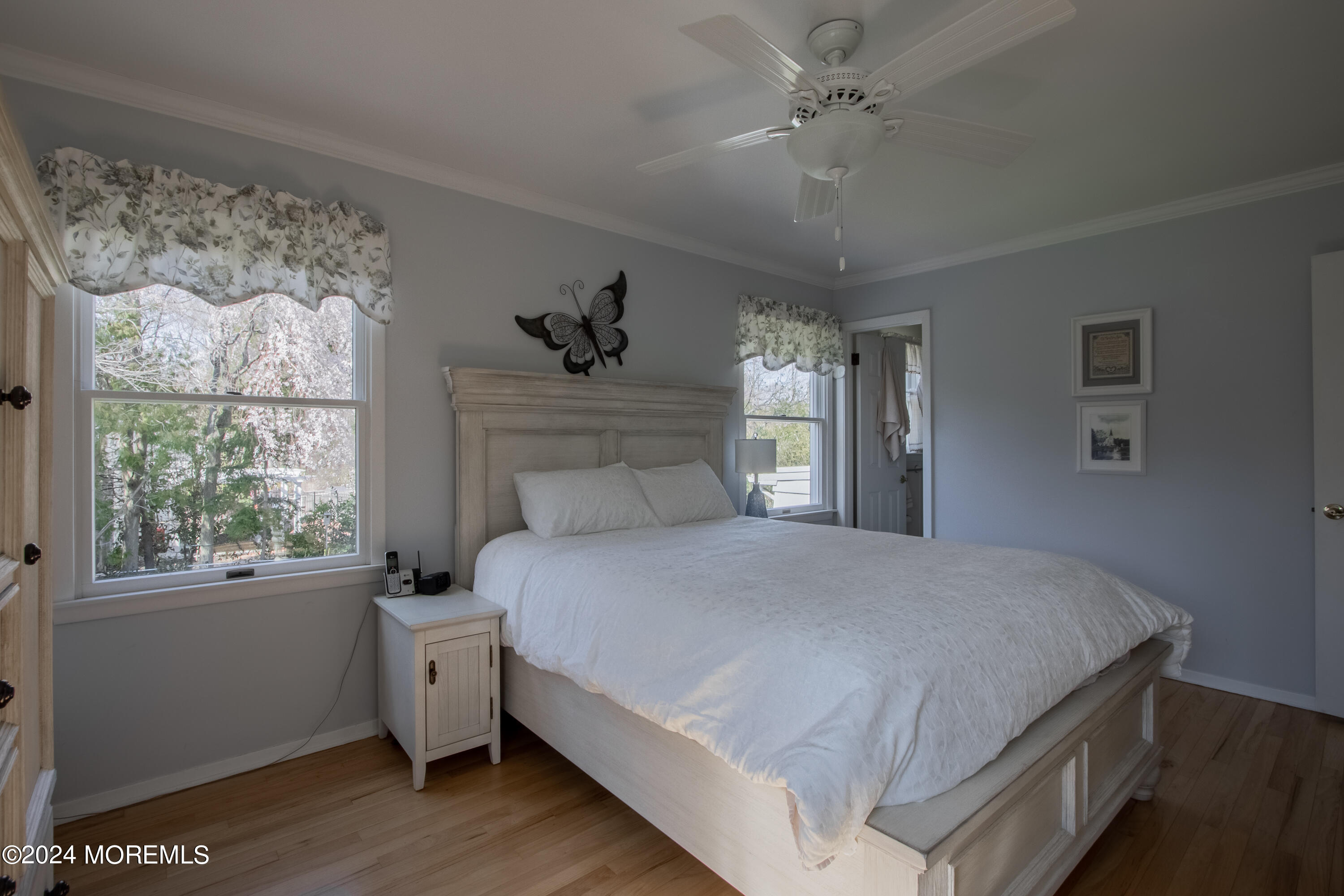 21 Rivers Edge Drive Little Silver, NJ 07739 - Photo 29 of 56 a bedroom with a large bed and a window