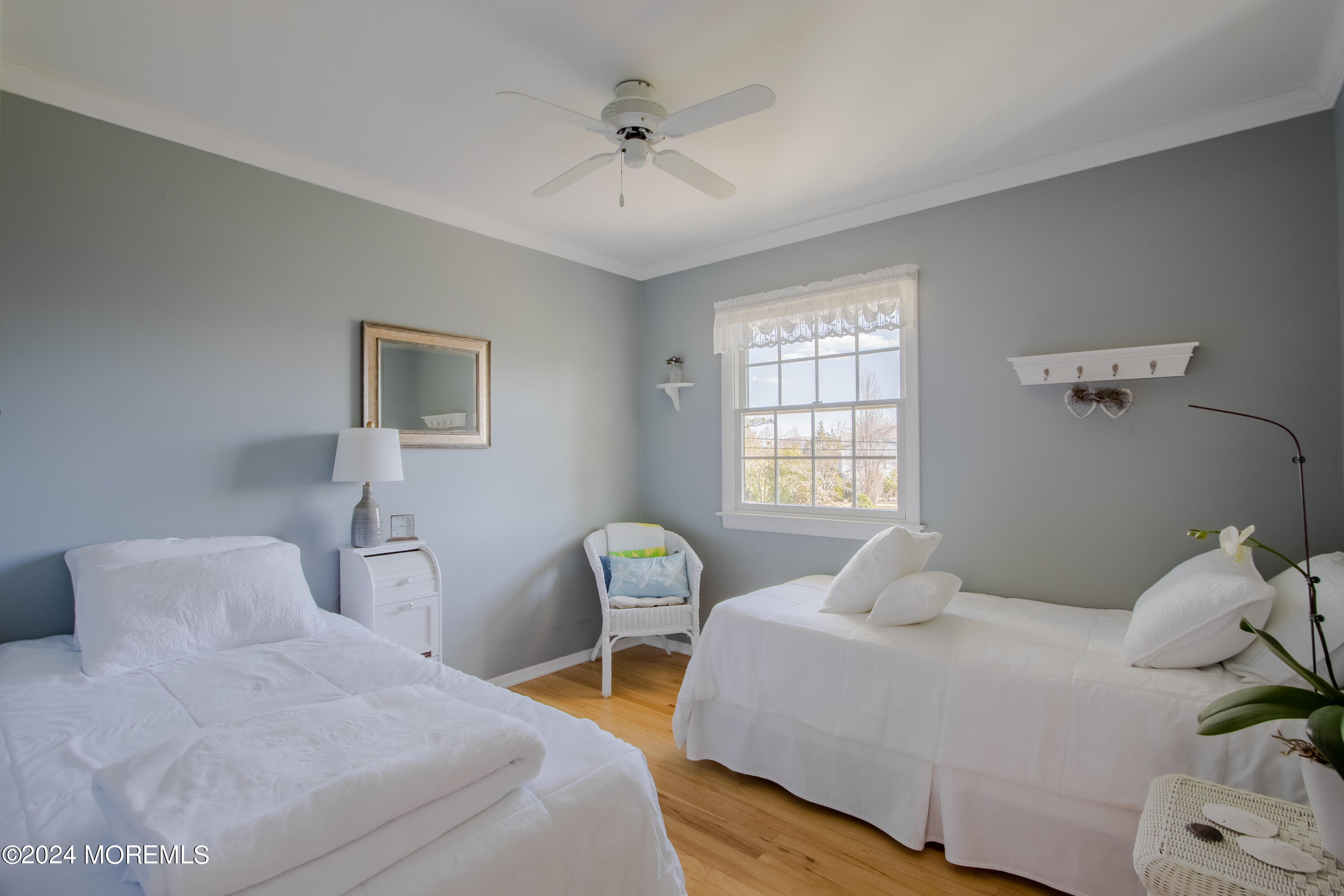 21 Rivers Edge Drive Little Silver, NJ 07739 - Photo 34 of 56 a bedroom with a bed and a table