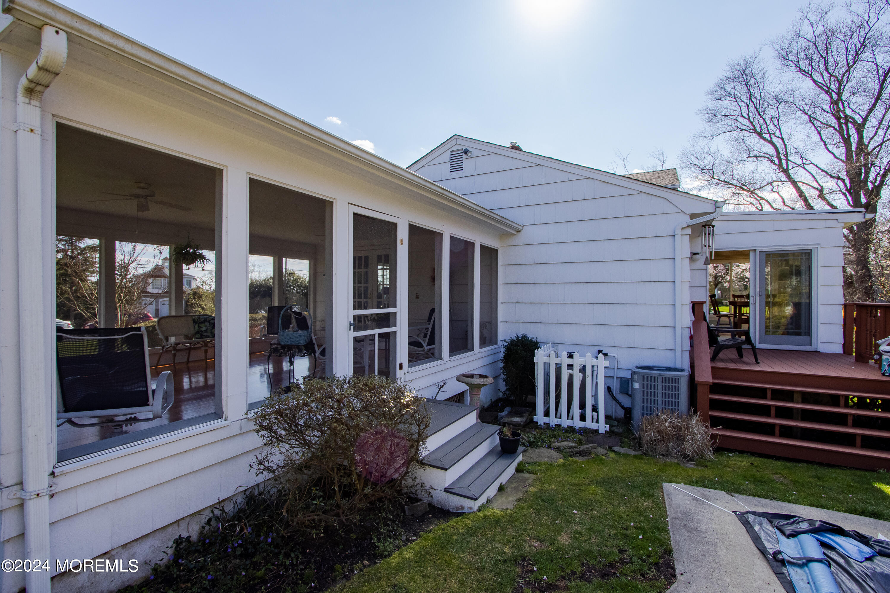 21 Rivers Edge Drive Little Silver, NJ 07739 - Photo 39 of 56 a view of house with backyard and outdoor seating