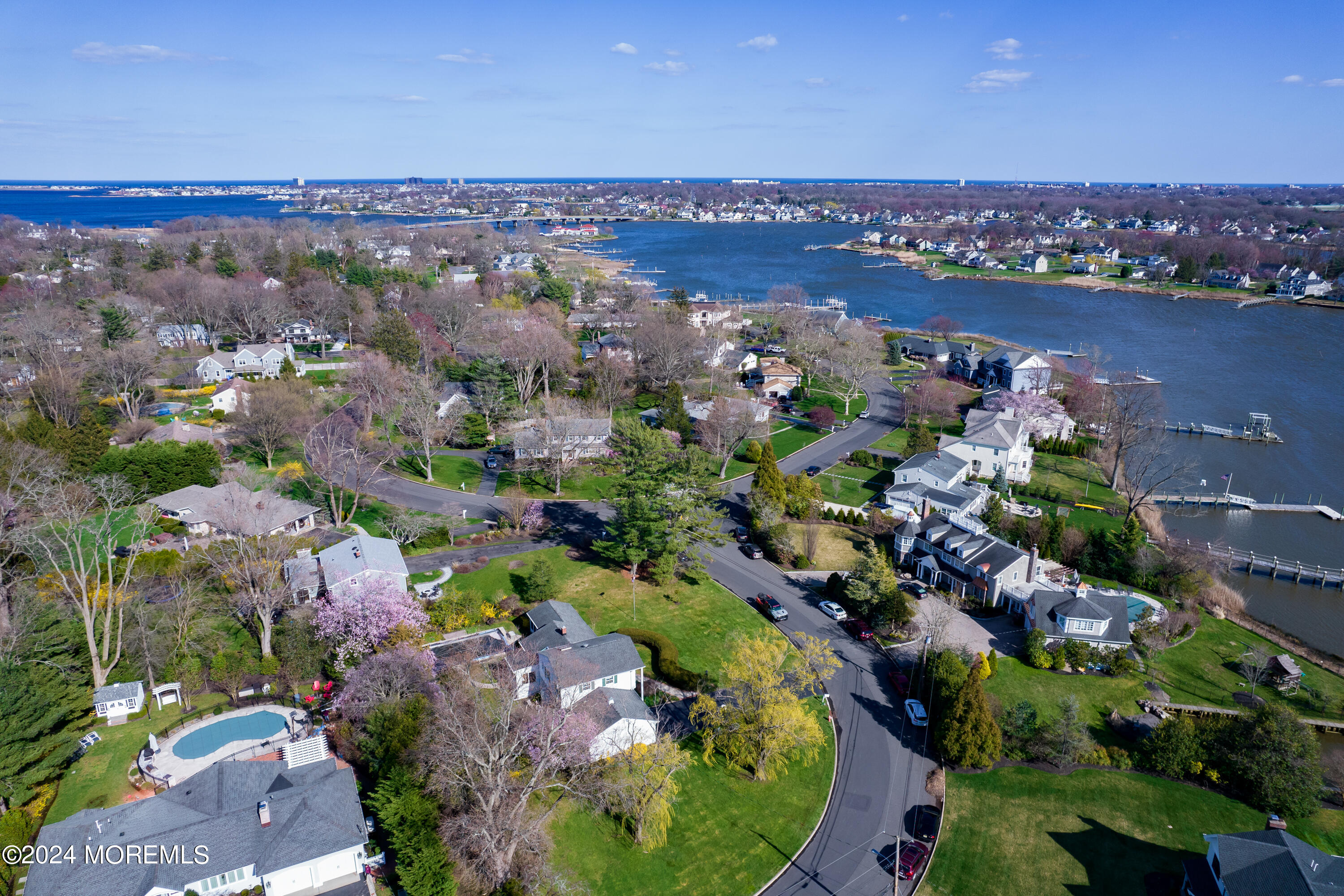 21 Rivers Edge Drive Little Silver, NJ 07739 - Photo 4 of 56 an aerial view of a city with lots of residential buildings ocean and mountain view in back