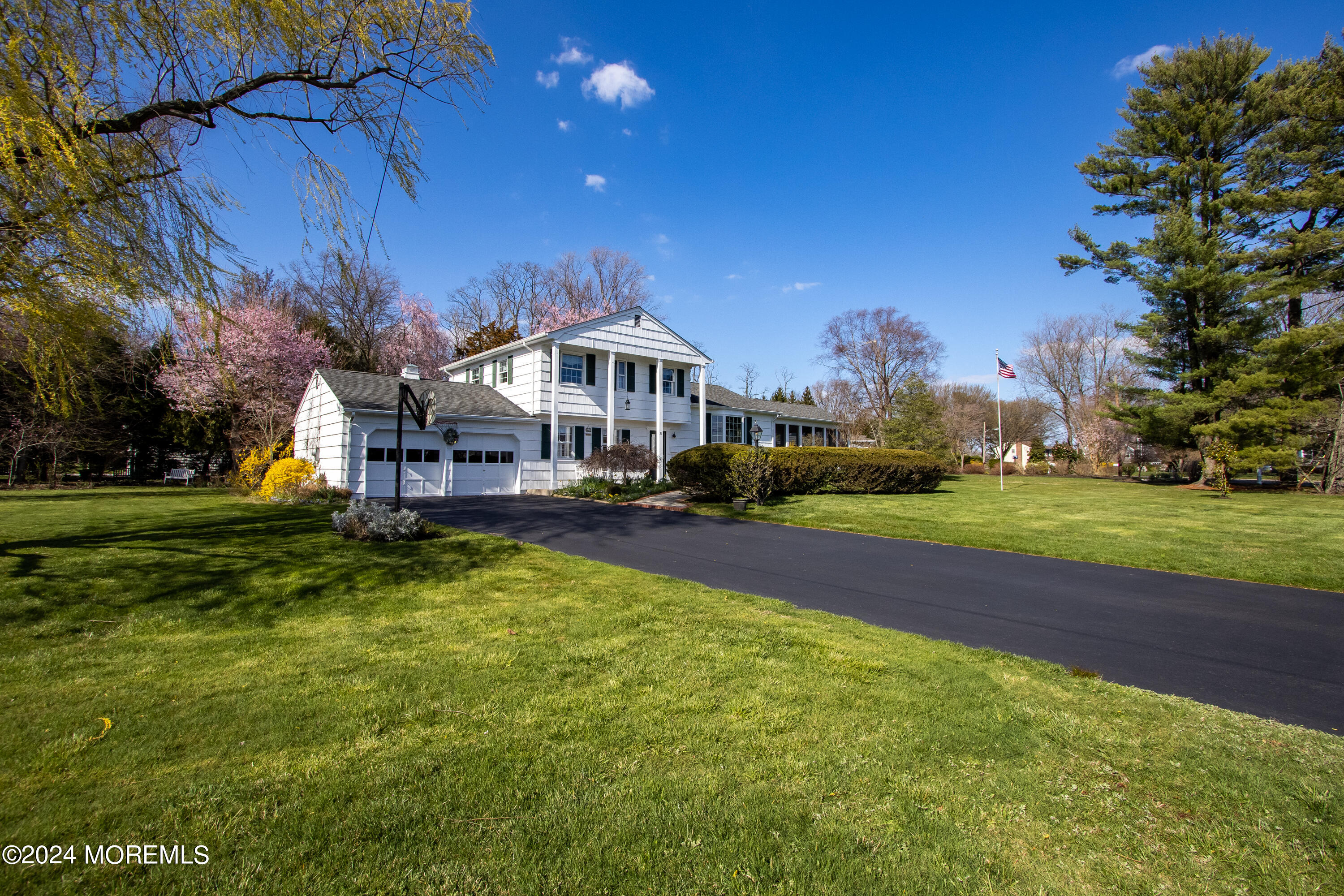 21 Rivers Edge Drive Little Silver, NJ 07739 - Photo 43 of 56 a view of a house with a big yard