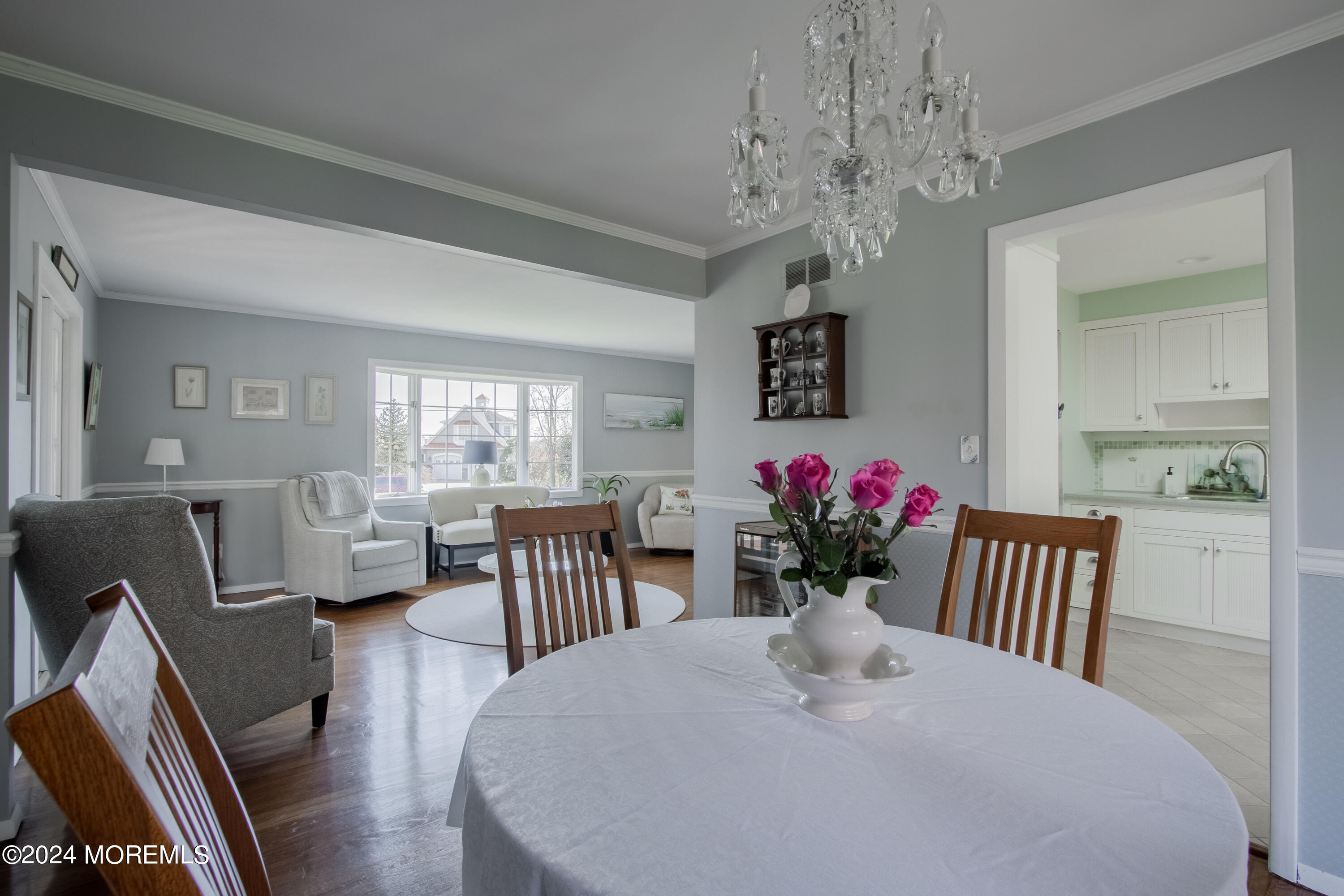 21 Rivers Edge Drive Little Silver, NJ 07739 - Photo 9 of 56 a dining room with furniture potted plants and wooden floor