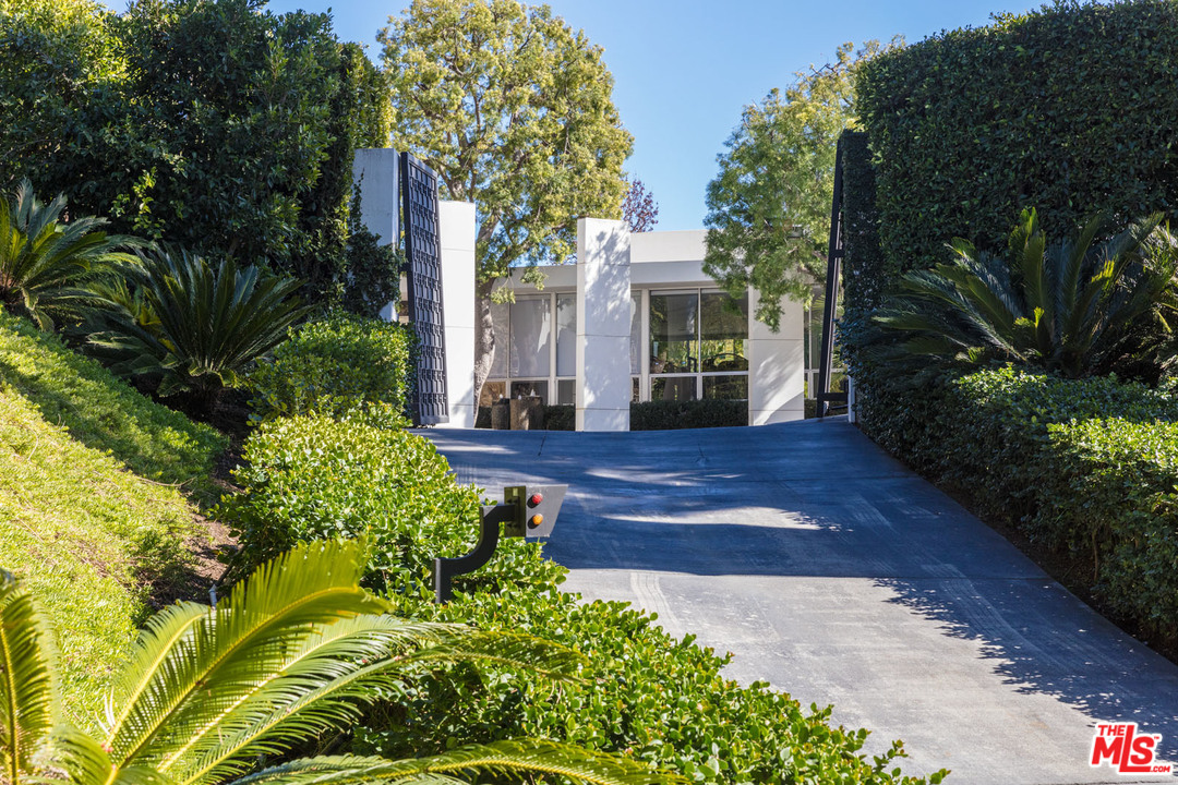 North Hillcrest Road Beverly Hills, CA 90210 - Photo 2 of 34 a view of a yard with plants and trees