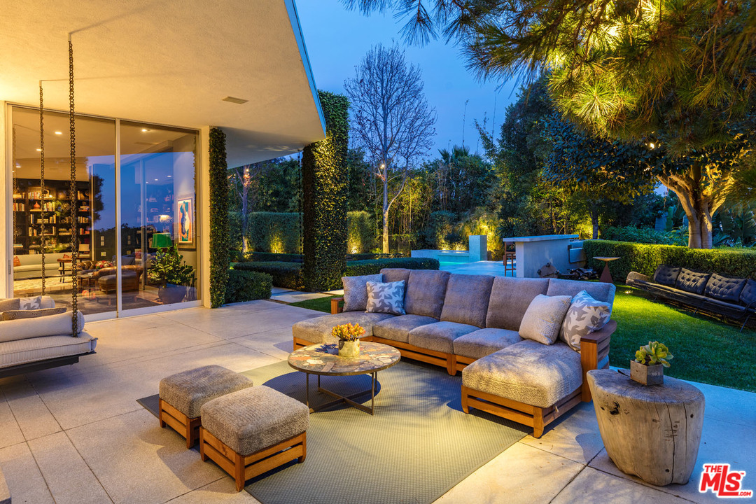 North Hillcrest Road Beverly Hills, CA 90210 - Photo 23 of 34 a outdoor space with patio couches and a potted plant