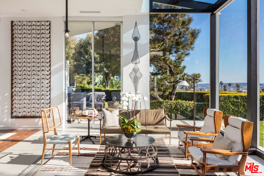 North Hillcrest Road Beverly Hills, CA 90210 - Photo 10 of 34 a building outdoor space with patio furniture