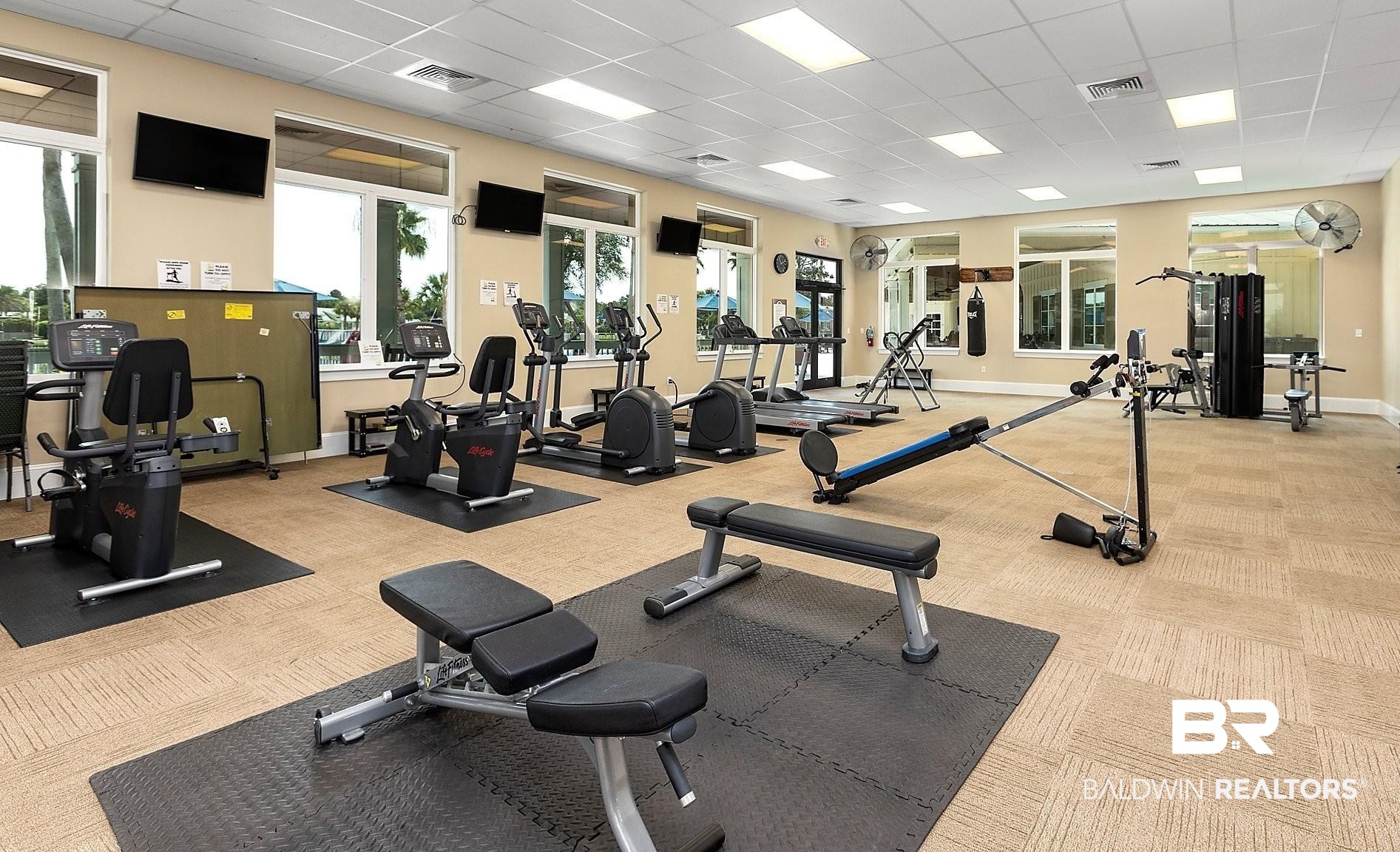 28114 Preserve Trail, Unit 190 Elberta, AL 36530 - Photo 51 of 69 Exercise room featuring a paneled ceiling