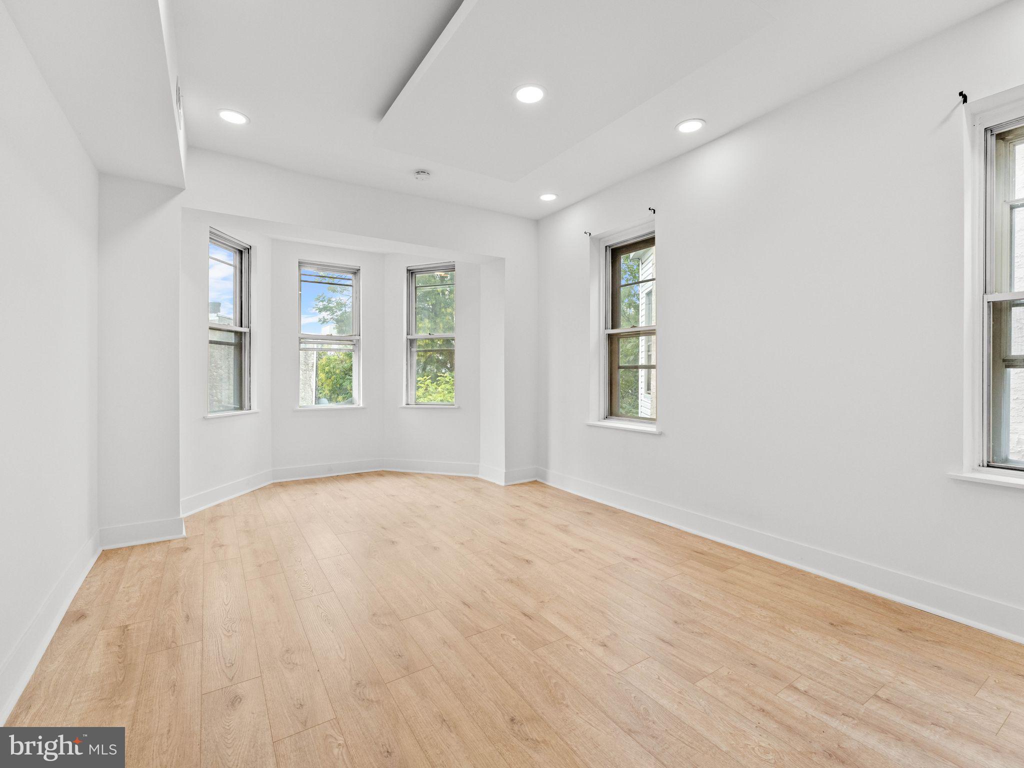 1606 Wharton Street Philadelphia, PA 19146 - Photo 11 of 31 an empty room with windows and closet