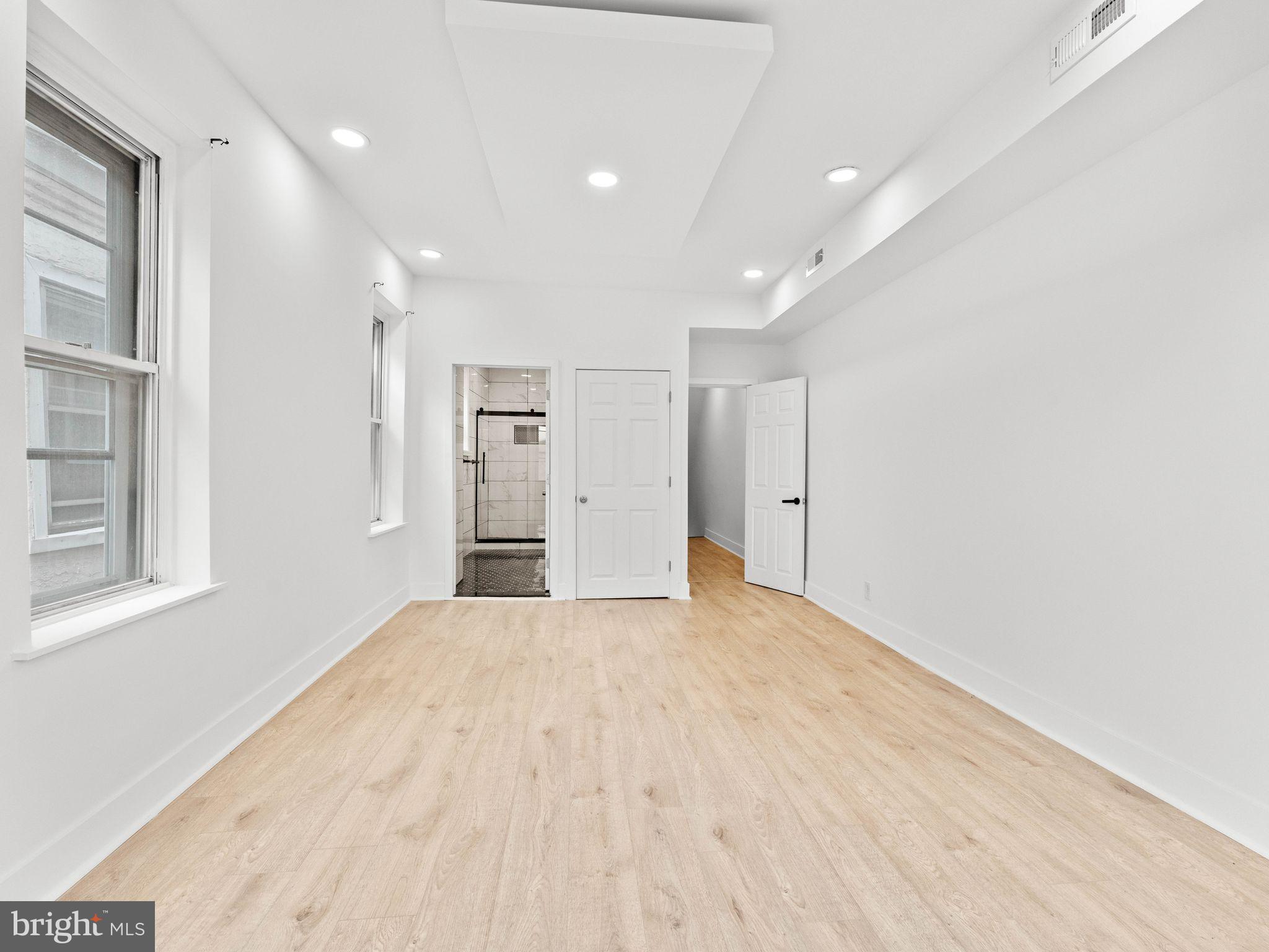 1606 Wharton Street Philadelphia, PA 19146 - Photo 12 of 31 a big room with closet and windows