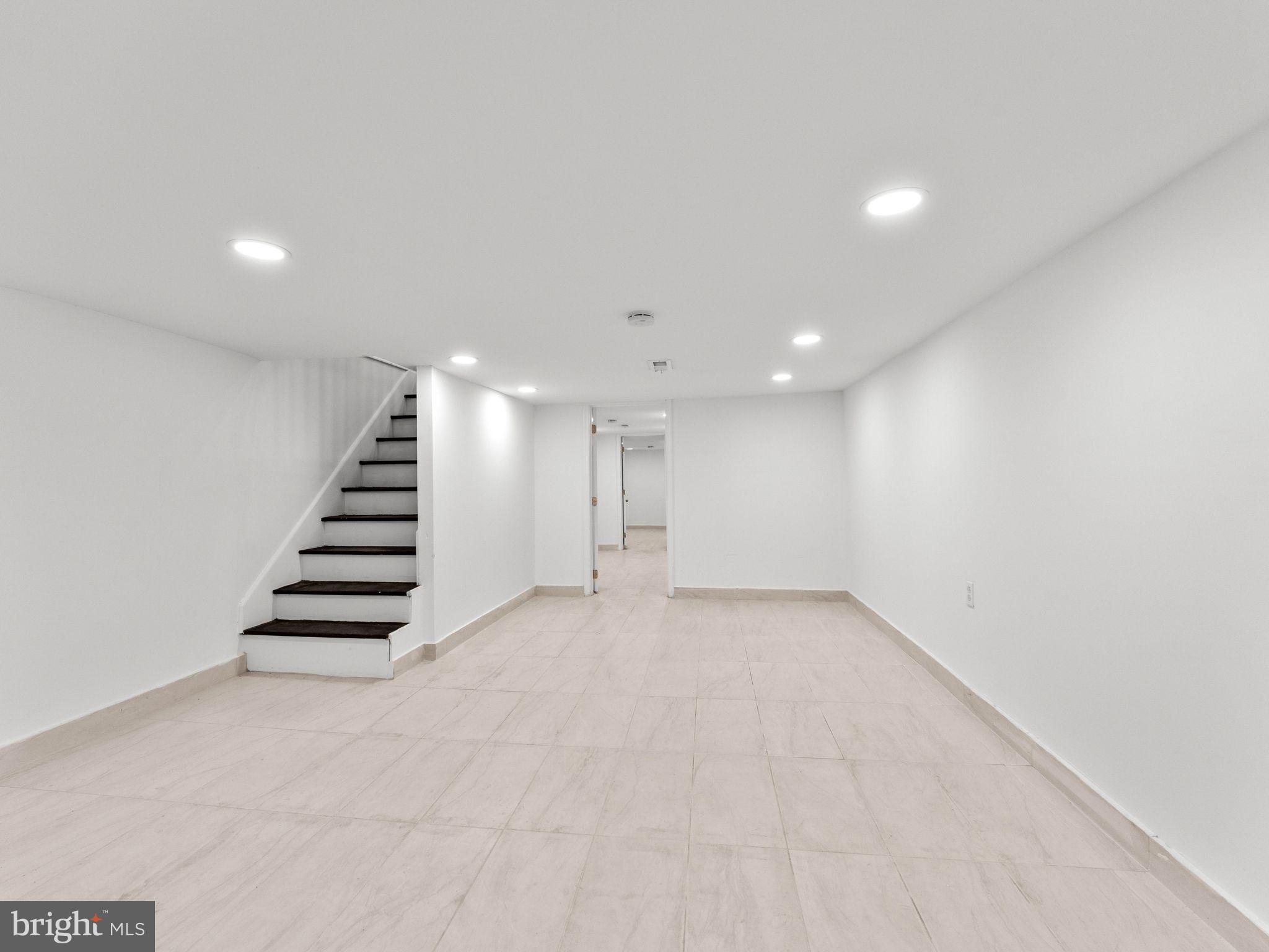 1606 Wharton Street Philadelphia, PA 19146 - Photo 24 of 31 a view of an empty room with stairs