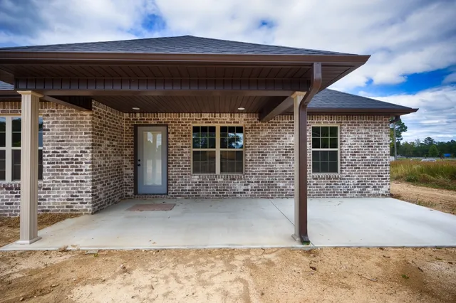 a view of a house with a patio