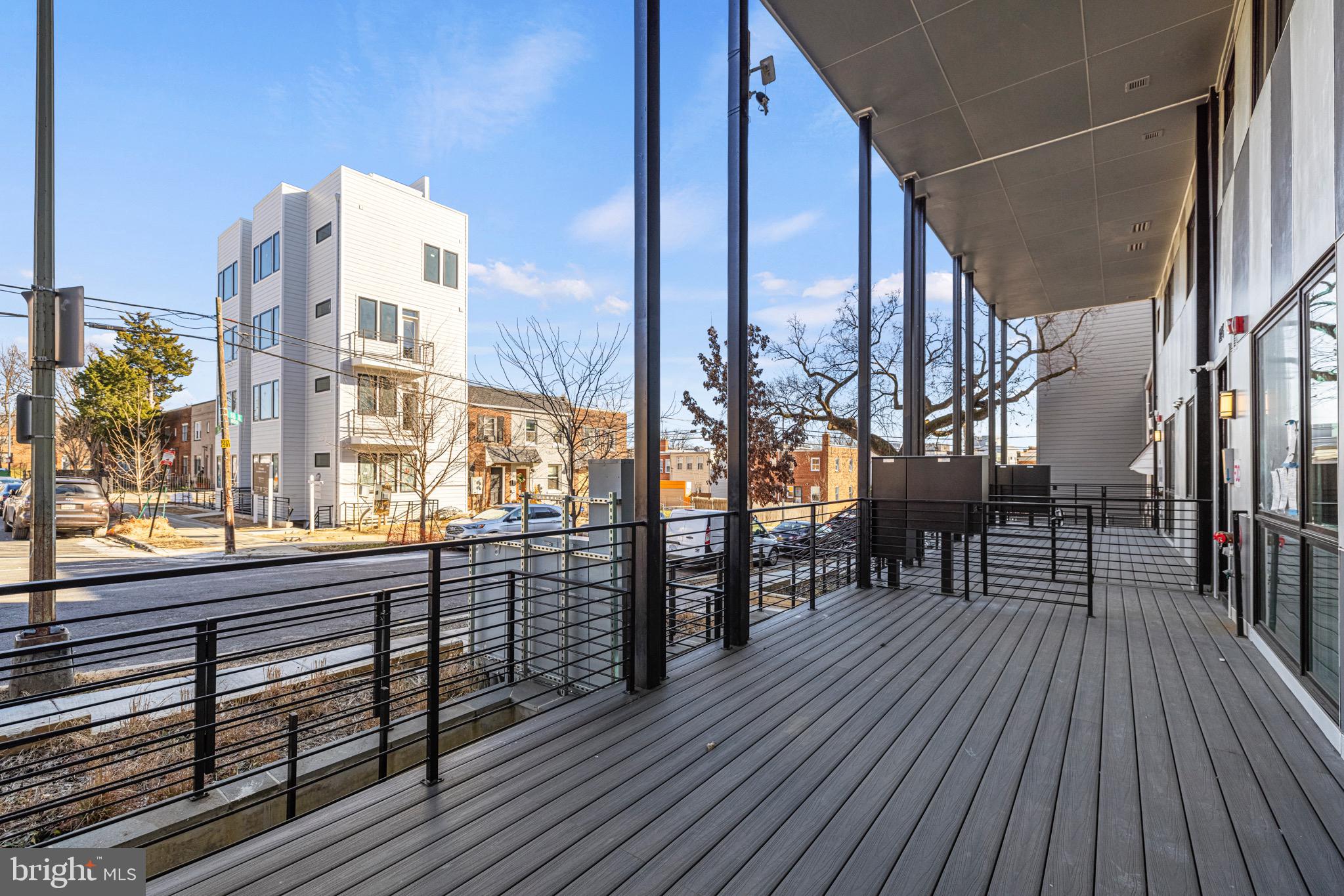 824 18th Street Northeast, Unit 3 Washington, DC 20002 - Photo 18 of 19 a view of a balcony with wooden floor