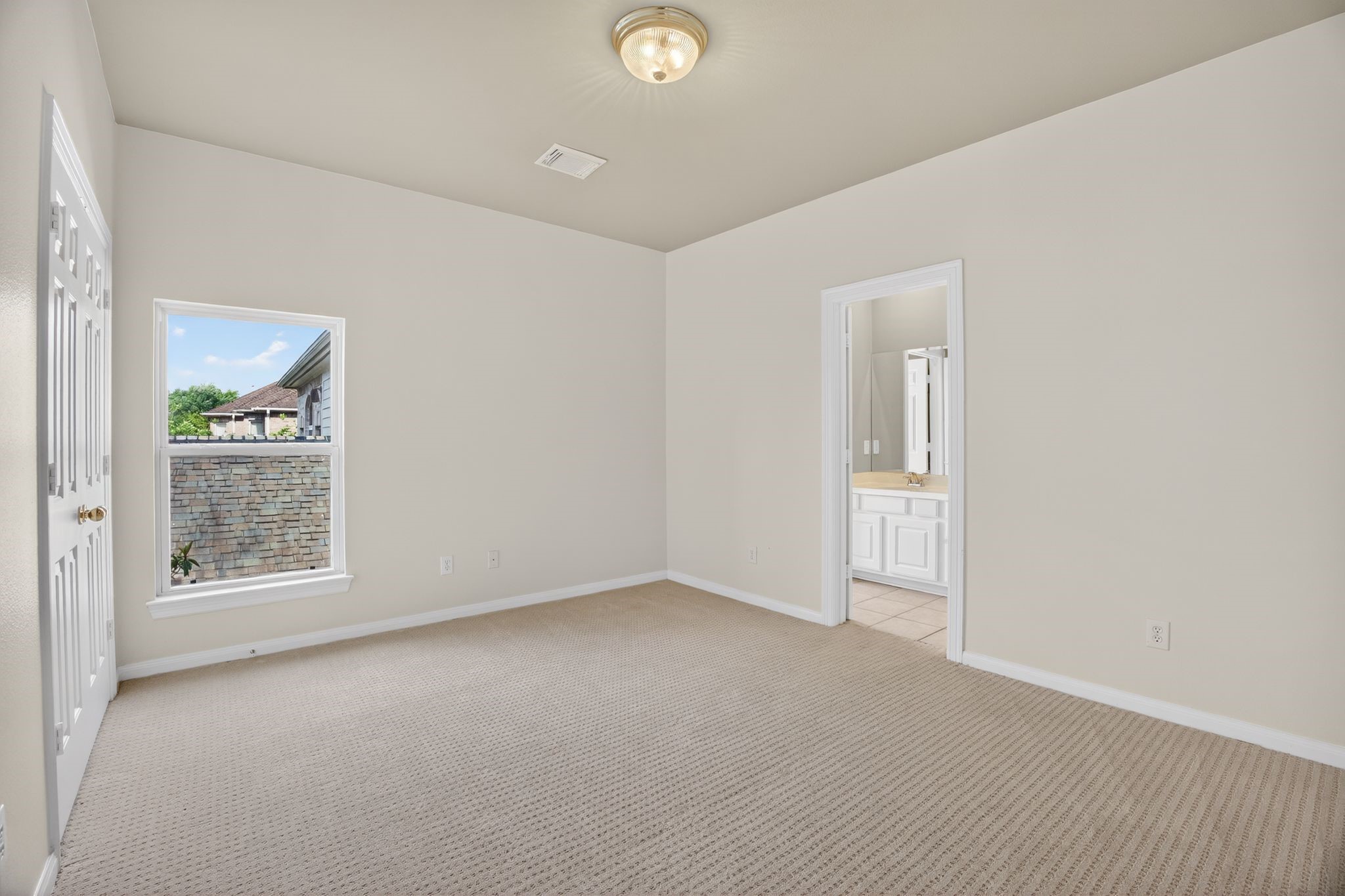11511 Gallant Ridge Lane Houston, TX 77082 - Photo 37 of 49 an empty room with windows and closet