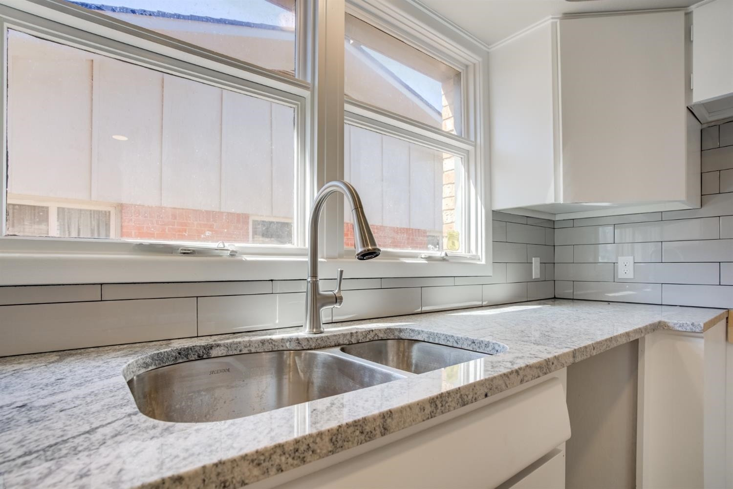 2113 66th Street Lubbock, TX 79412 - Photo 19 of 44 a close view of sink and tap