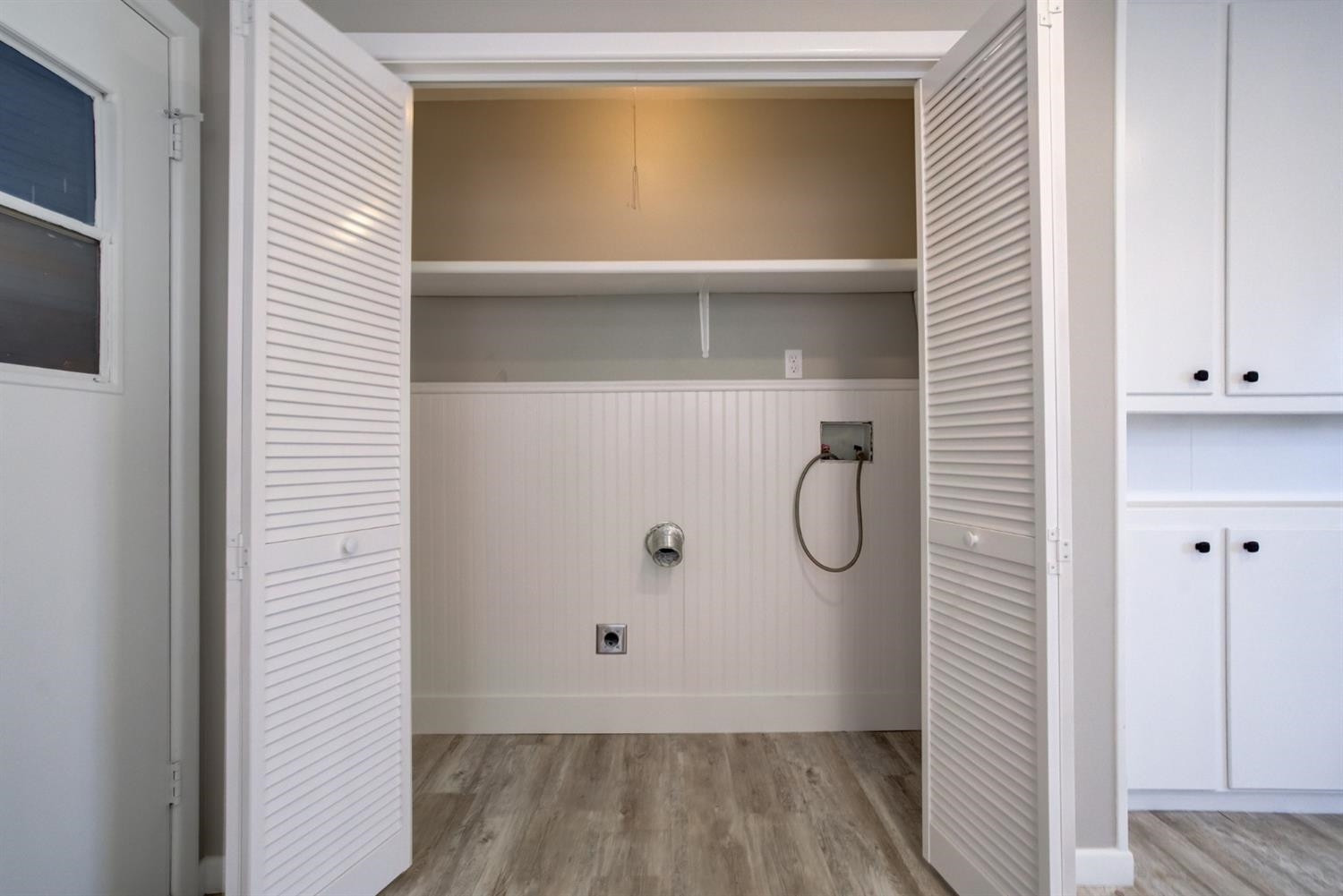 2113 66th Street Lubbock, TX 79412 - Photo 21 of 44 a bathroom with a glass shower door and a window