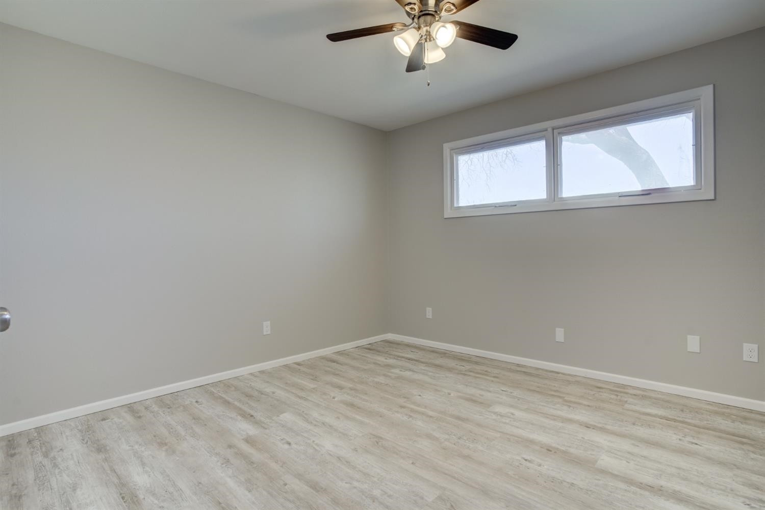 2113 66th Street Lubbock, TX 79412 - Photo 31 of 44 a view of an empty room with a window