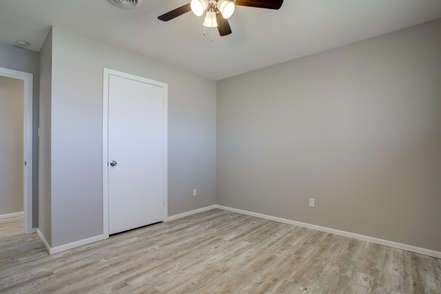 2113 66th Street Lubbock, TX 79412 - Photo 32 of 44 an empty room with a empty space and chandelier fan