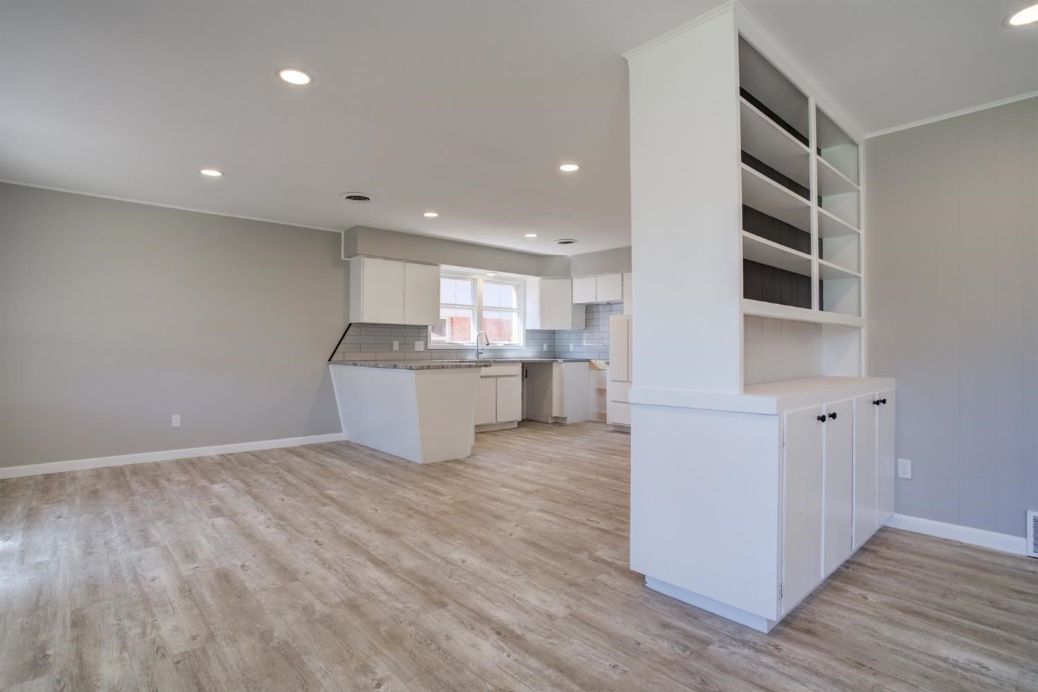2113 66th Street Lubbock, TX 79412 - Photo 10 of 44 a view of kitchen with wooden floor