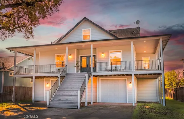 a front view of a house with glass windows