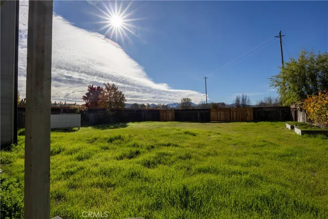 a view of a house with a big yard