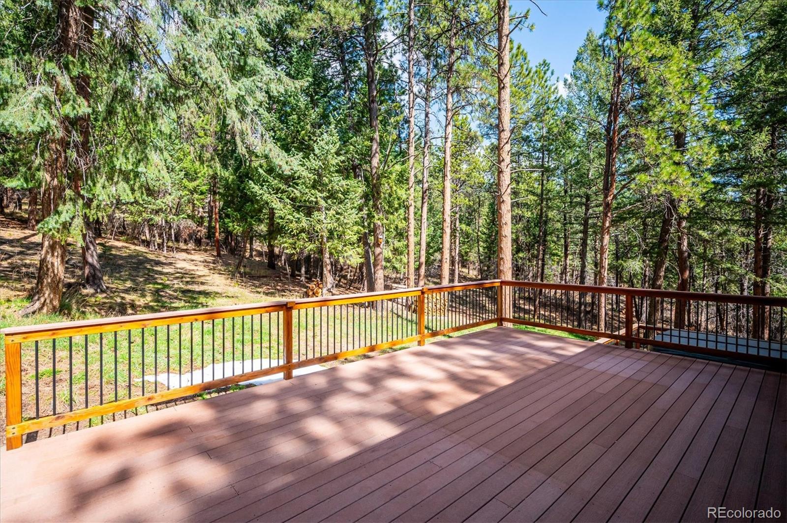 20025 Flint Lane Morrison, CO 80465 - Photo 29 of 35 a view of a roof deck