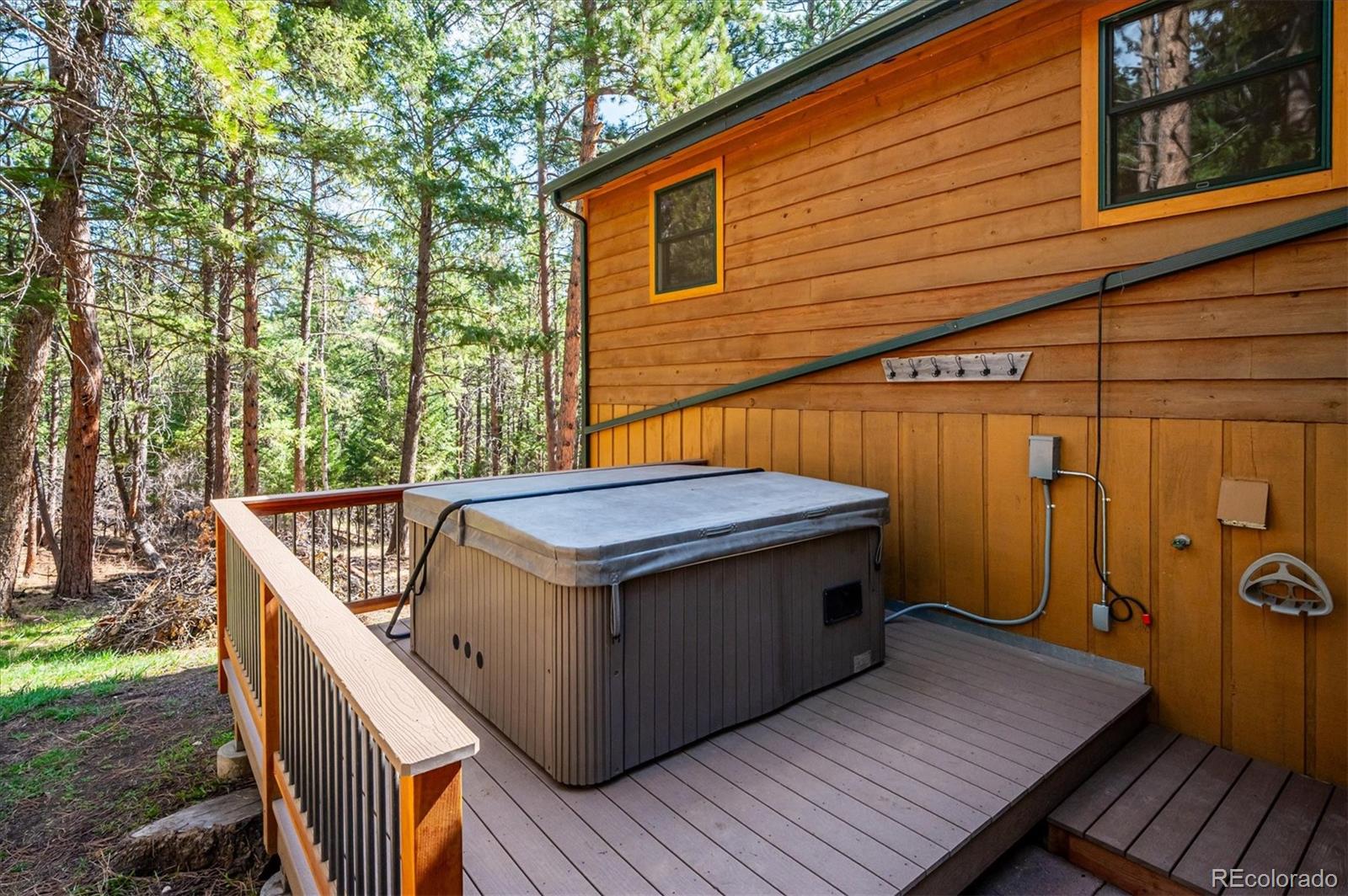 20025 Flint Lane Morrison, CO 80465 - Photo 32 of 35 a view of a wooden deck