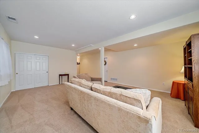 a living room with furniture and a couch