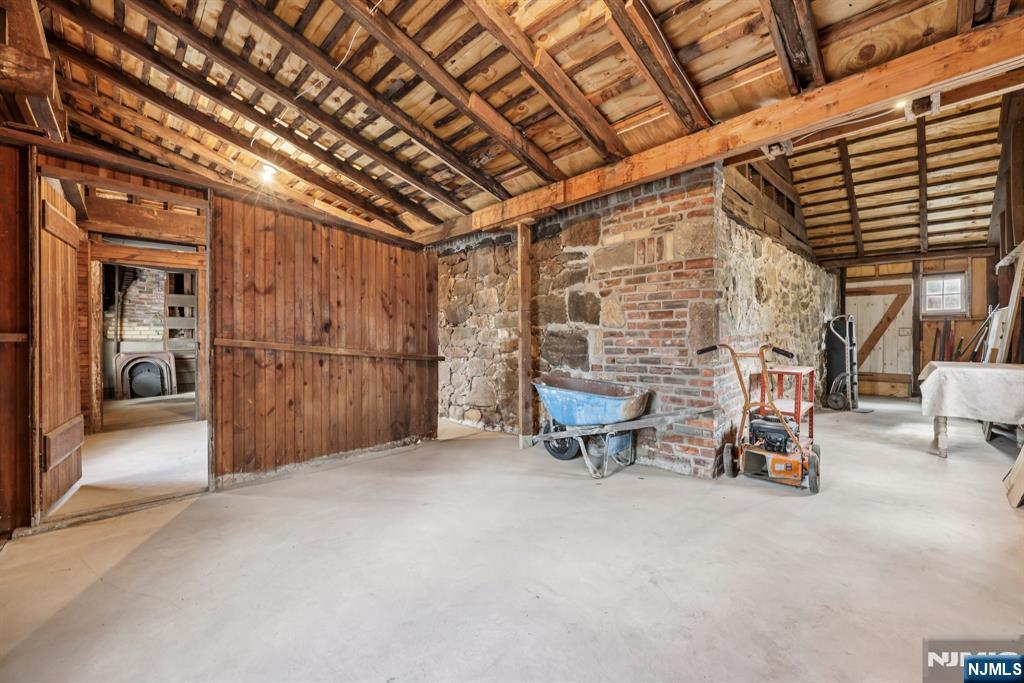 142 Island Road Mahwah, NJ 07430 - Photo 11 of 21 a view of a chairs in garage