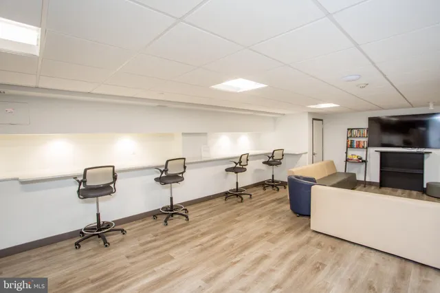 a view of a livingroom with furniture and a couch