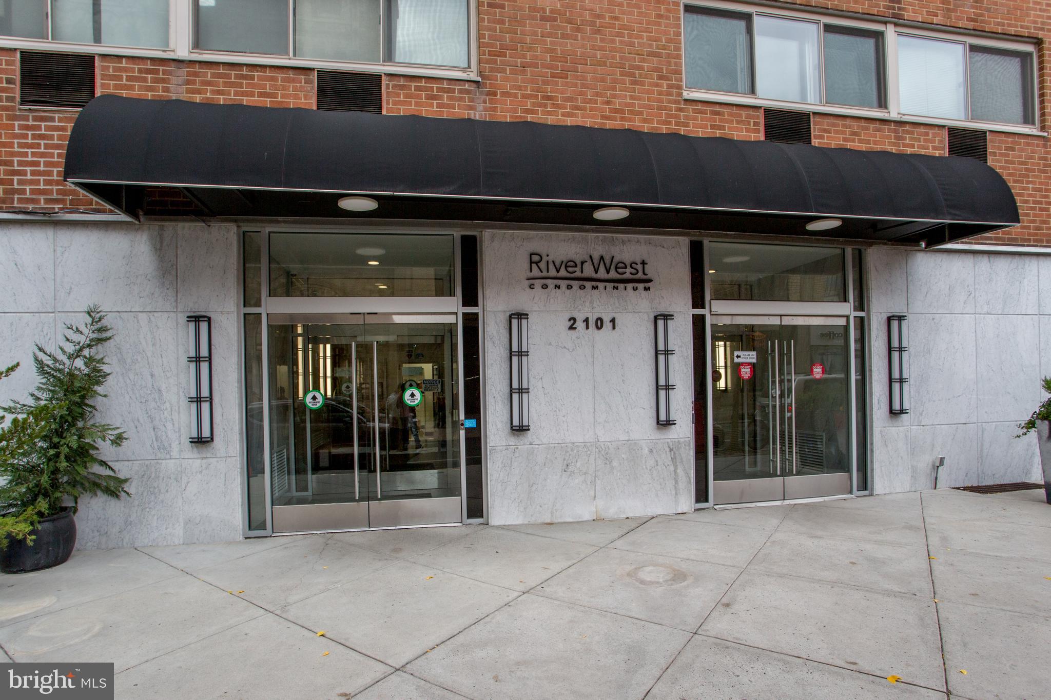 2101-17 Chestnut Street, Unit 1809 Philadelphia, PA 19103 - Photo 4 of 38 a front view of a building with entryway