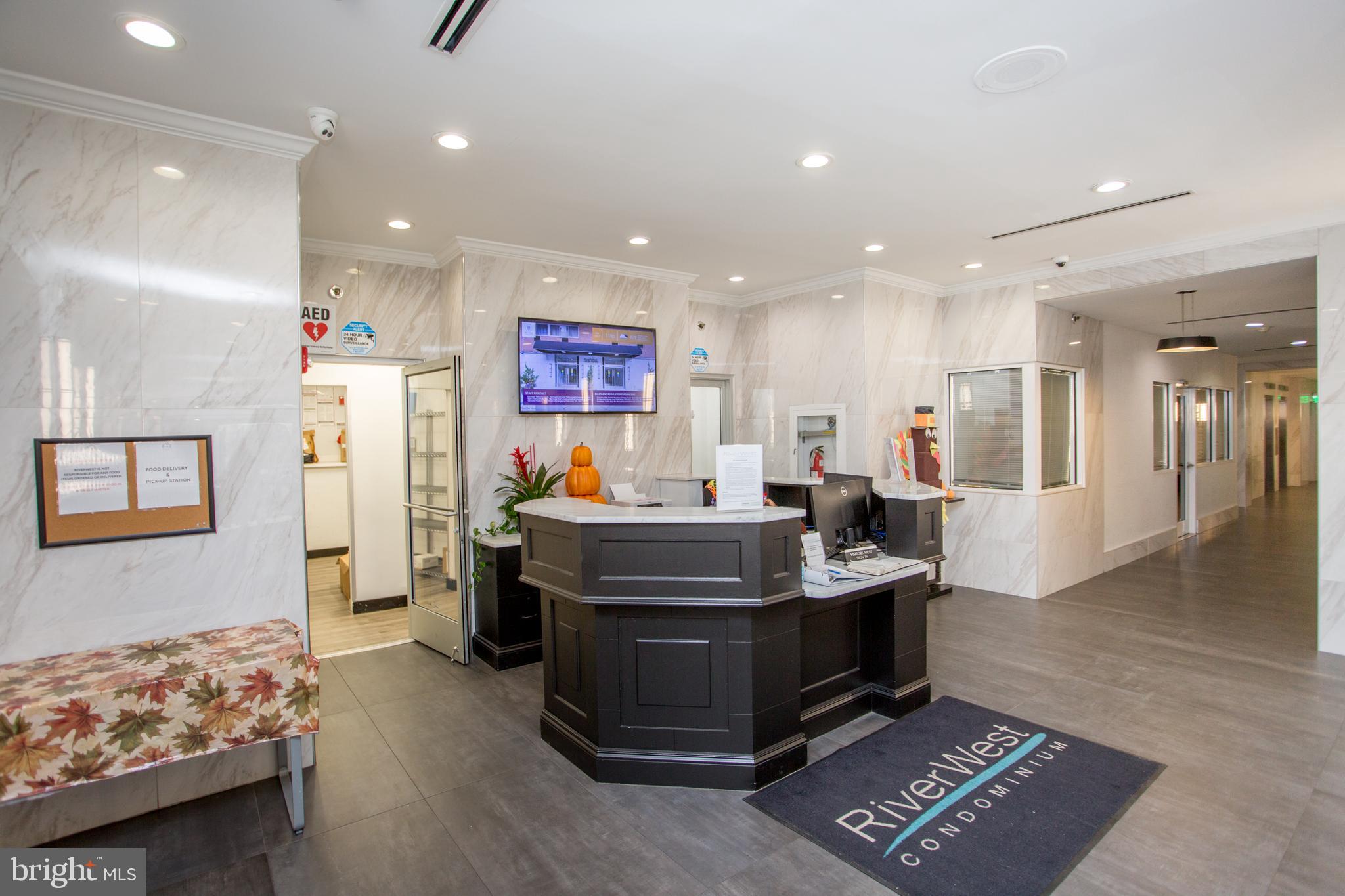 2101-17 Chestnut Street, Unit 1809 Philadelphia, PA 19103 - Photo 5 of 38 a room with furniture and a couch