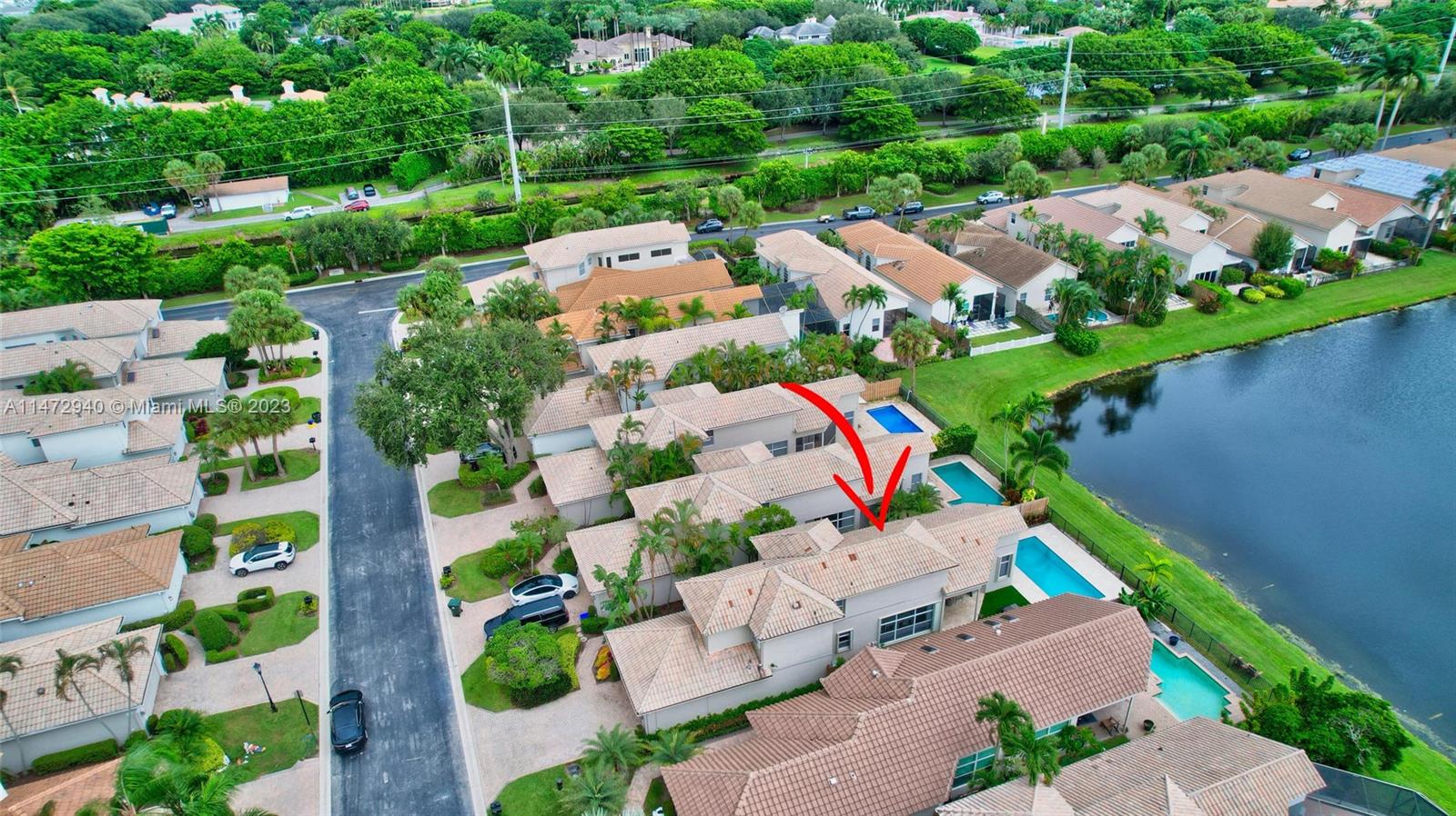 6636 Northwest 25th Avenue Boca Raton, FL 33496 - Photo 7 of 96 an aerial view of a house with a garden