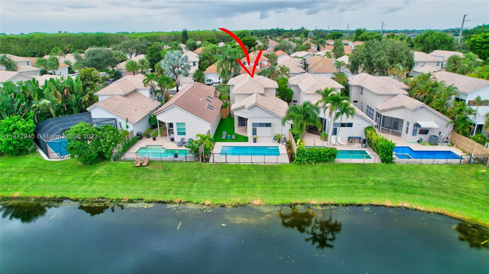 6636 Northwest 25th Avenue Boca Raton, FL 33496 - Photo 9 of 96 an aerial view of residential houses with outdoor space and street view