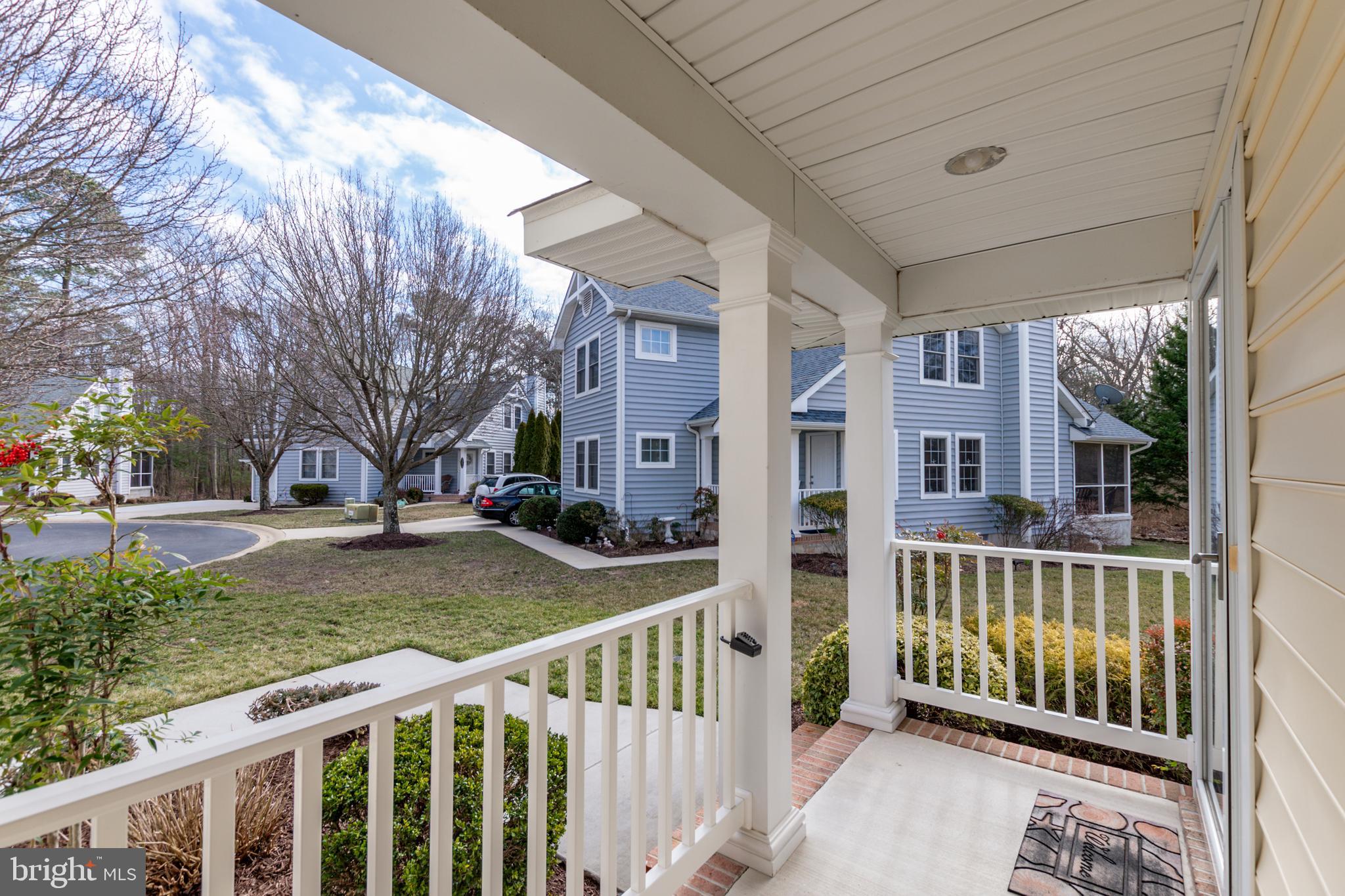 33878 Waterside Drive, Unit 15 Frankford, DE 19945 - Photo 2 of 38 Relax on your spacious front porch