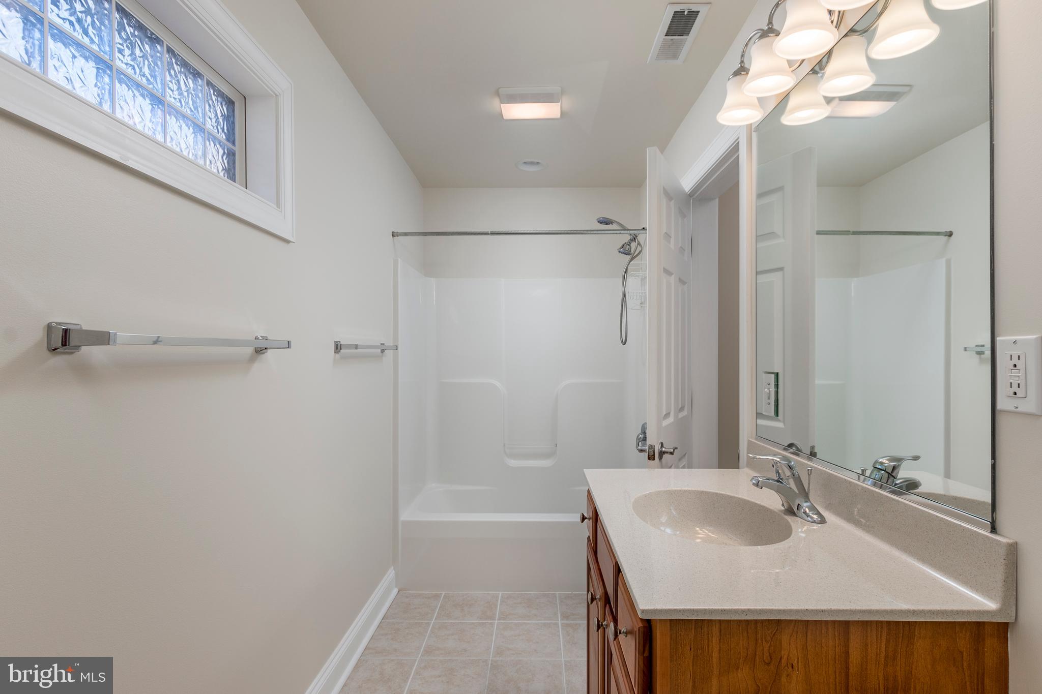 33878 Waterside Drive, Unit 15 Frankford, DE 19945 - Photo 22 of 38 Jack & Jill bathroom