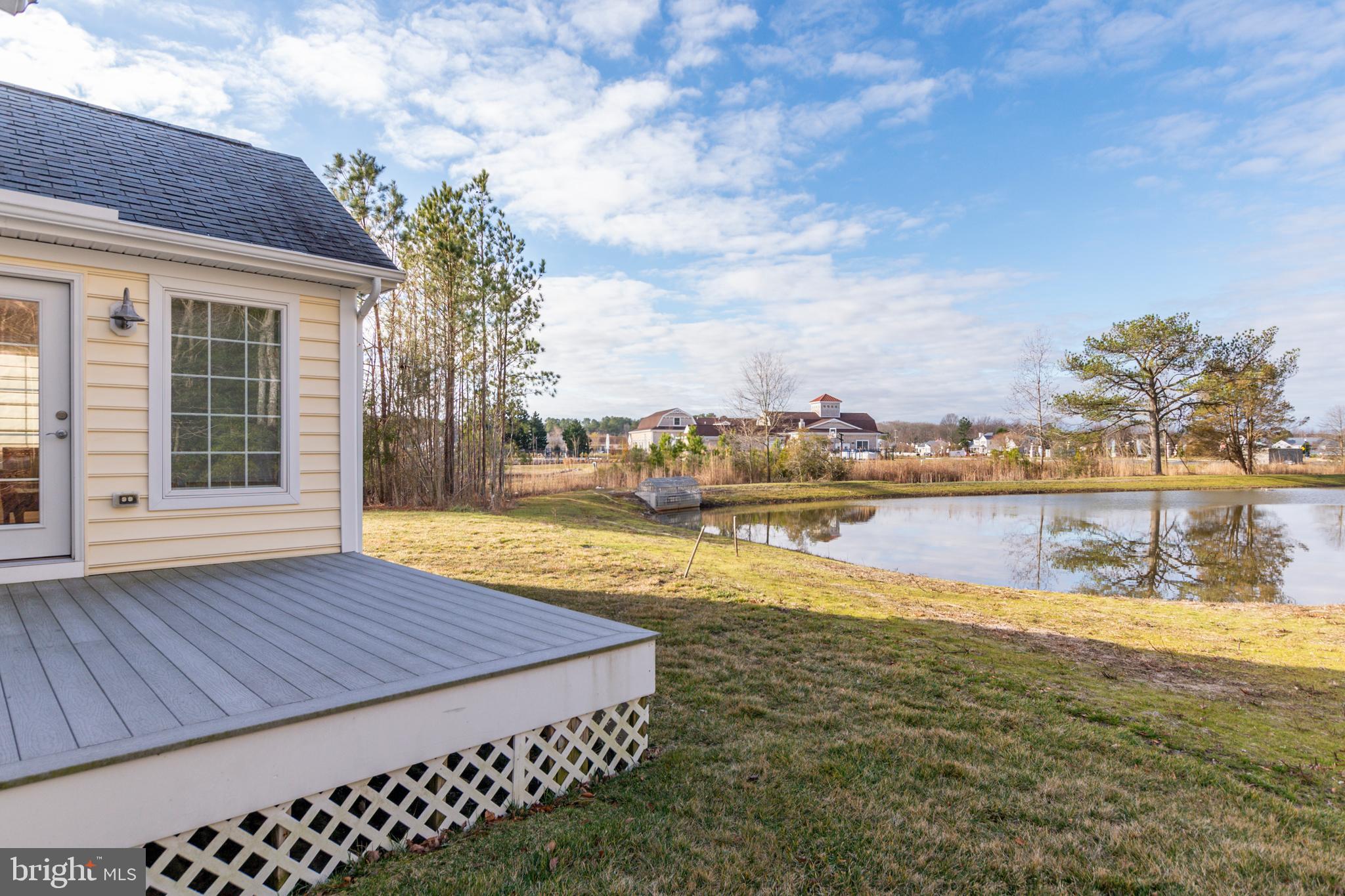 33878 Waterside Drive, Unit 15 Frankford, DE 19945 - Photo 30 of 38 Relax on the deck with pond views