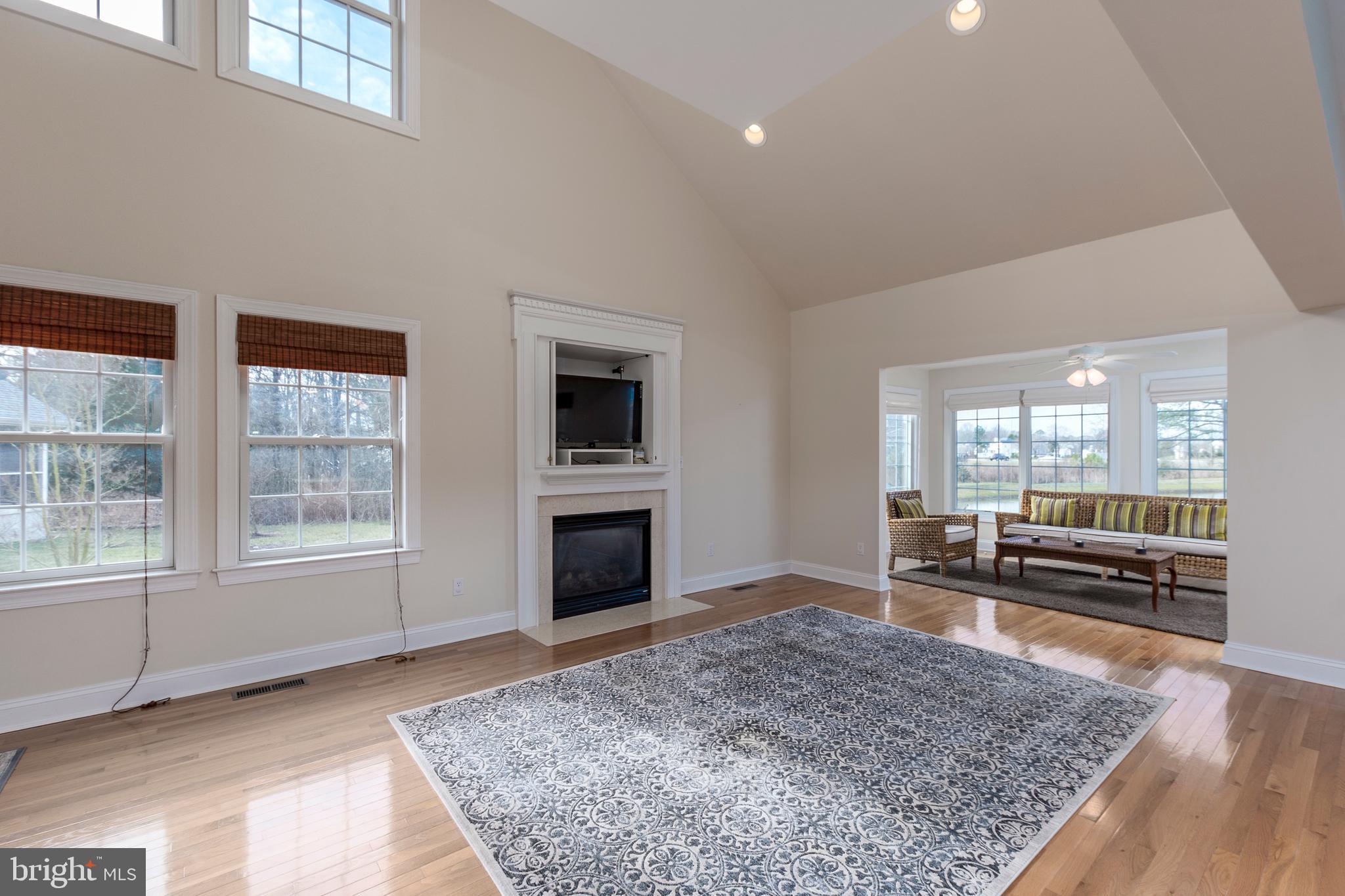 33878 Waterside Drive, Unit 15 Frankford, DE 19945 - Photo 8 of 38 Cozy up to the gas fireplace