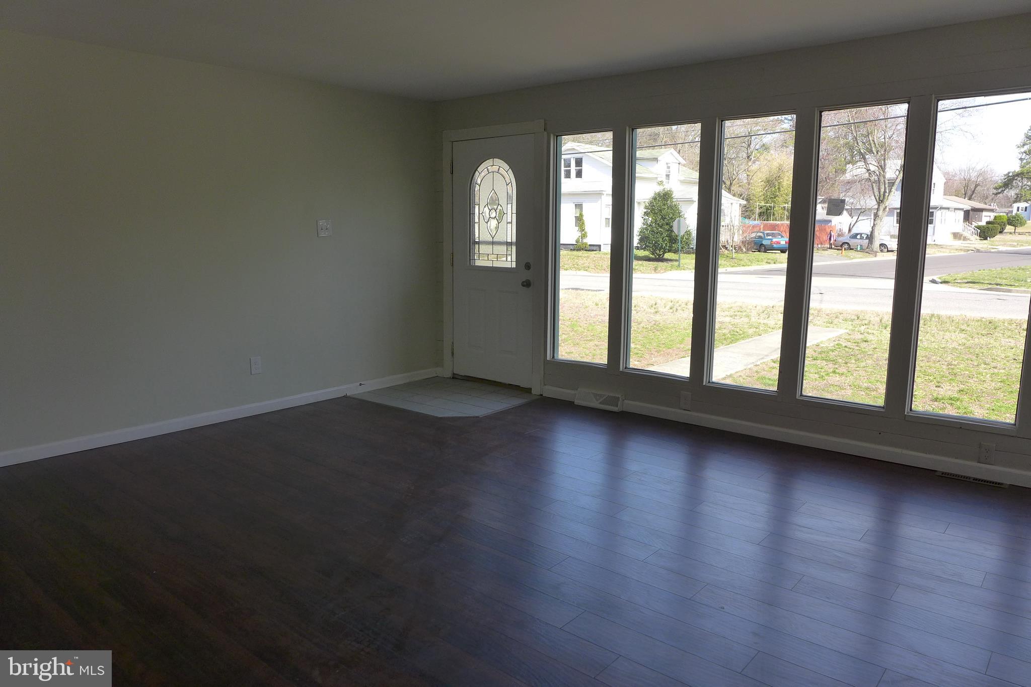 730 Norcross Road Lindenwold, NJ 08021 - Photo 9 of 25 Living Room, showing entry door