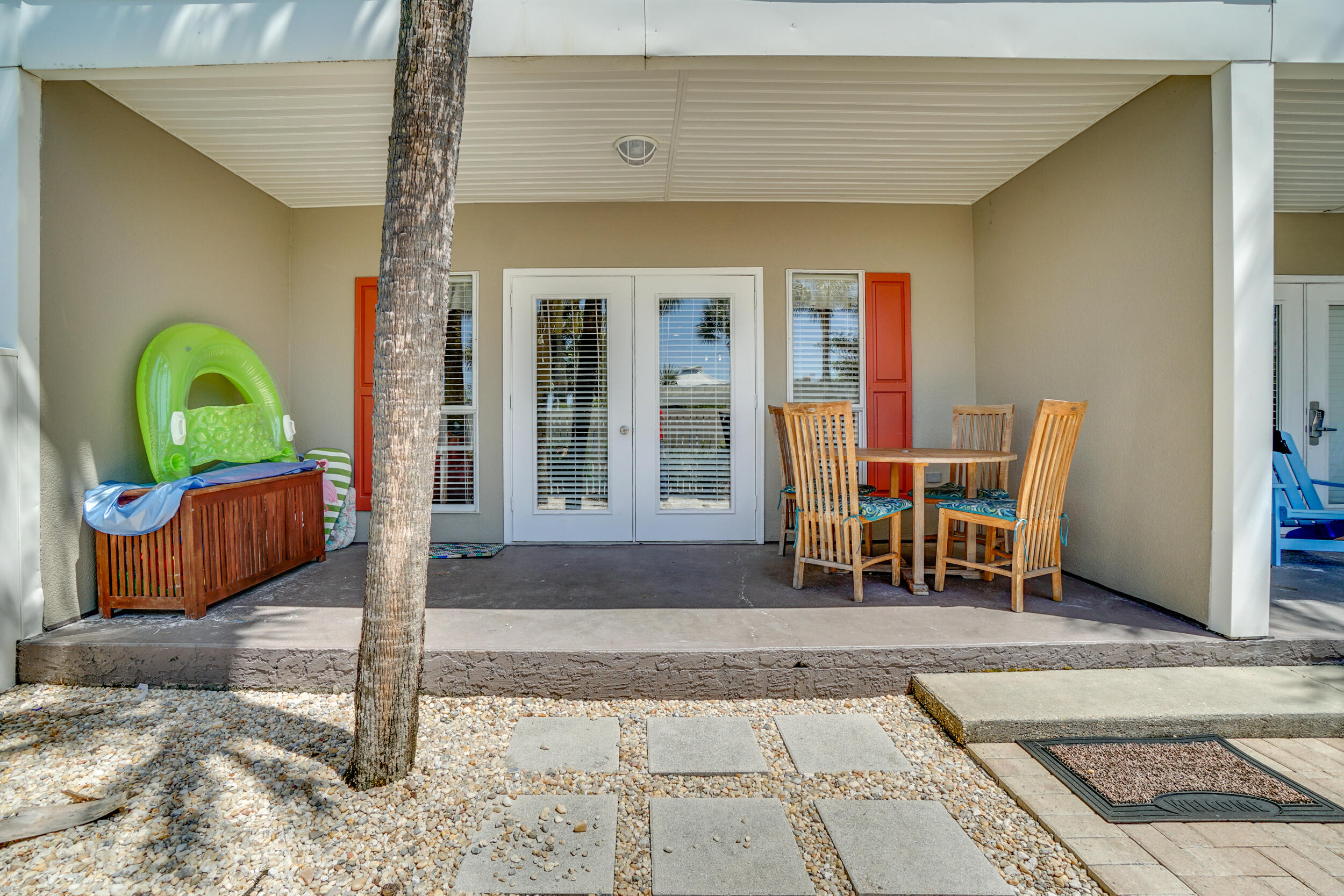 144 Spires Lane, Unit 107 Santa Rosa Beach, FL 32459 - Photo 15 of 17 a view of a house with a patio and a yard