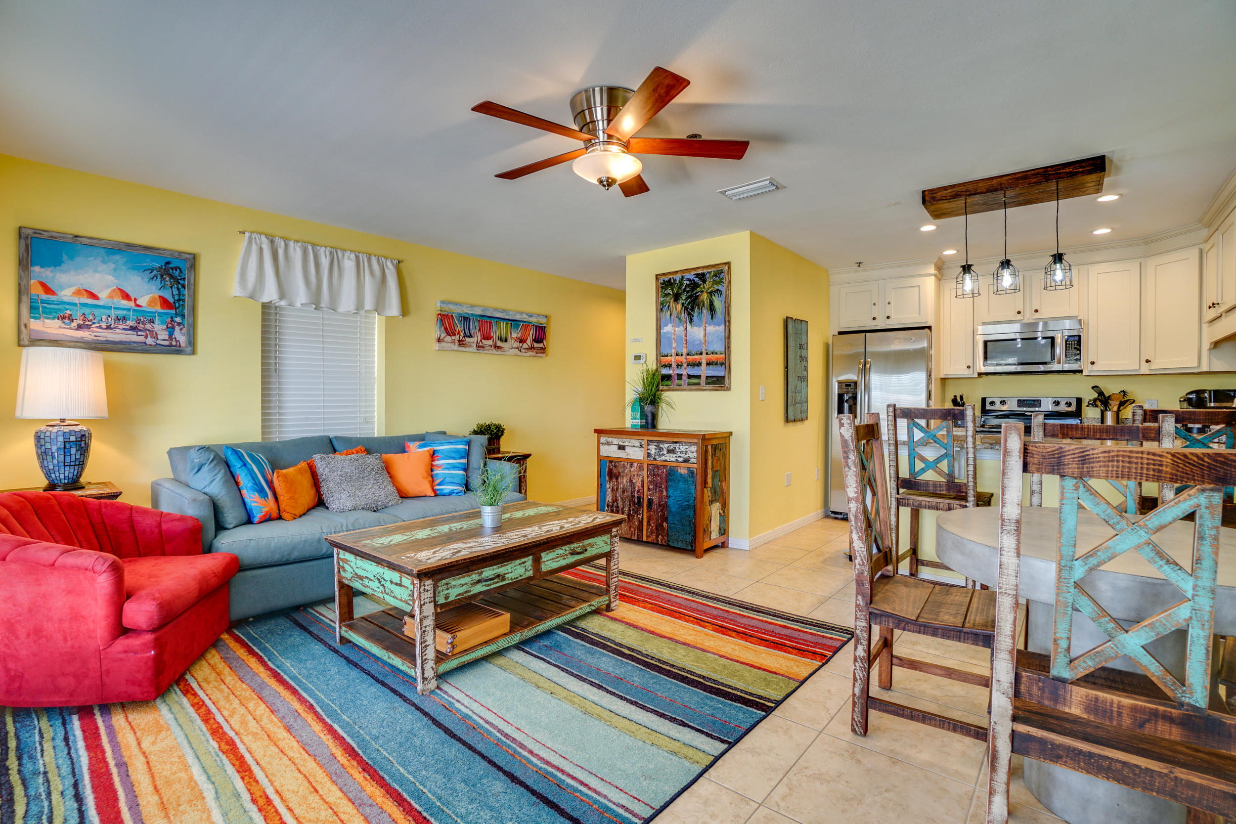 144 Spires Lane, Unit 107 Santa Rosa Beach, FL 32459 - Photo 4 of 17 a living room with furniture and a table